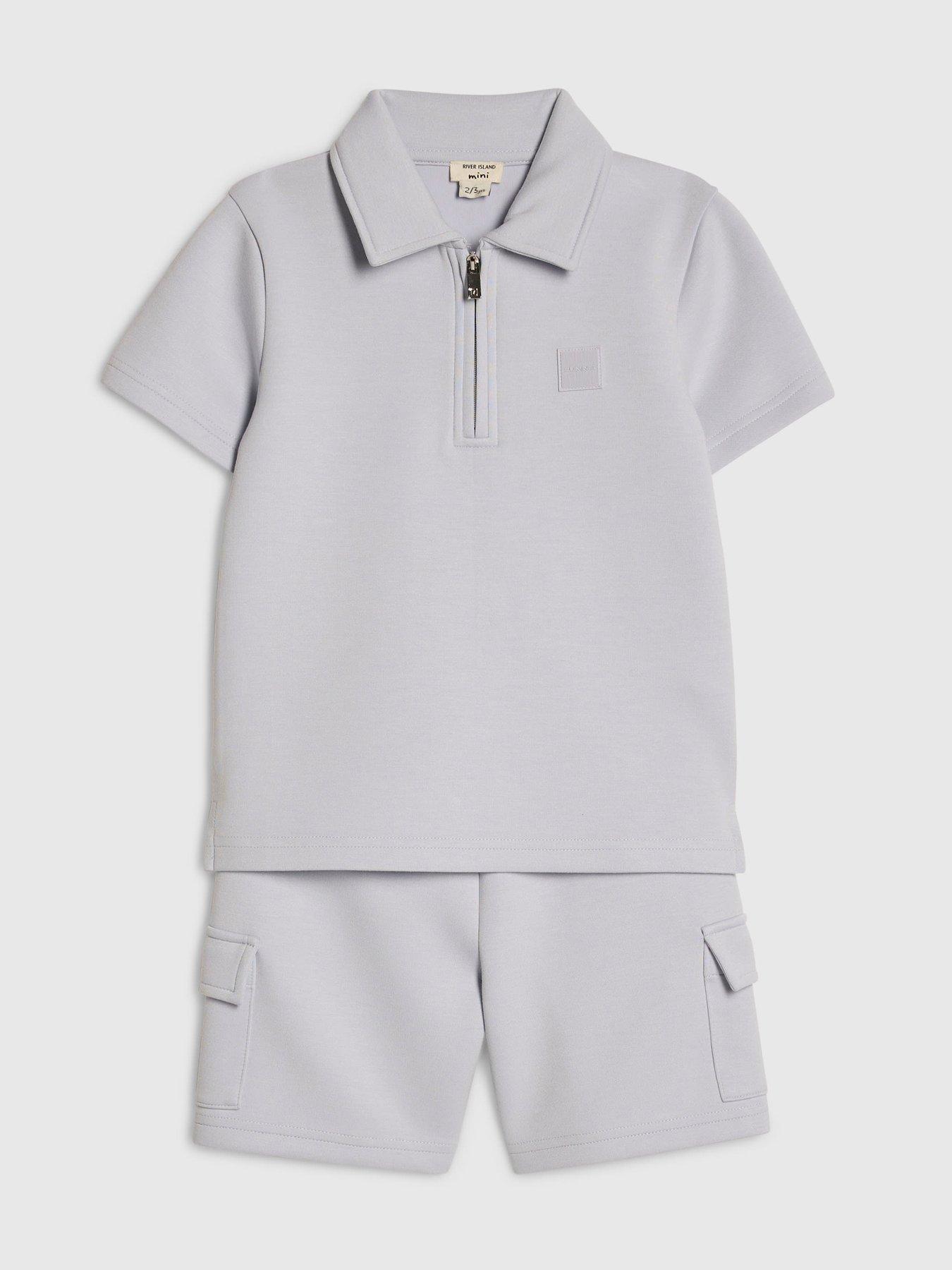 Image 3 of 5 of River Island Mini Mini Boys Luminis Badge Polo T-Shirt &amp; Shorts Set - Light Blue