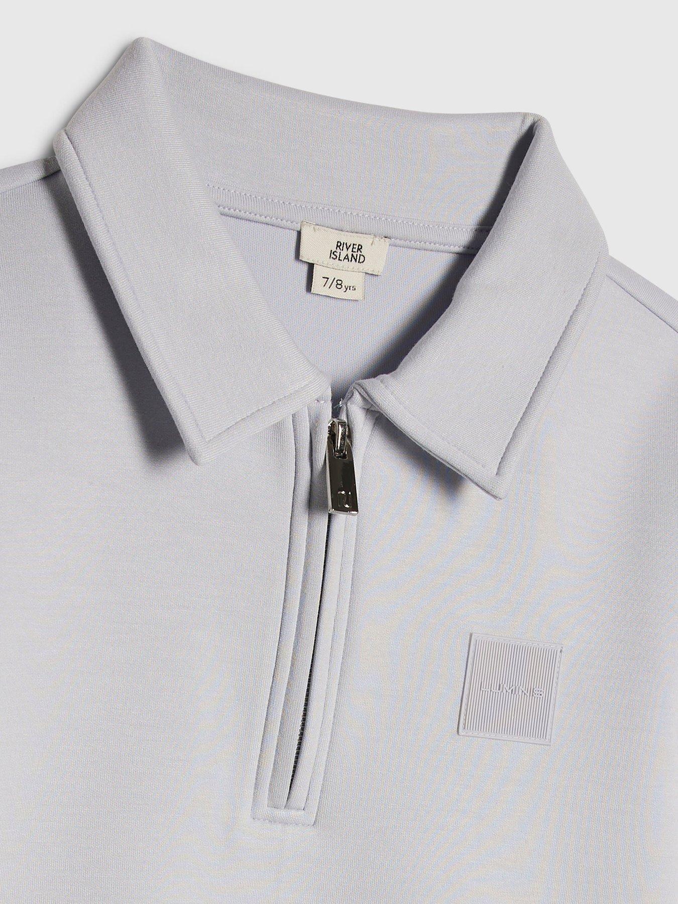 Image 5 of 5 of River Island Older Boys Luminis Badge Polo T-Shirt &amp; Shorts Set&nbsp;- Light Blue
