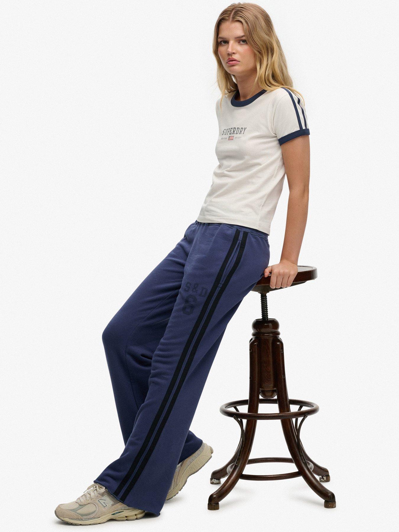 Image 4 of 6 of Superdry Athletic Essentials Stripe Flare Joggers - Blue