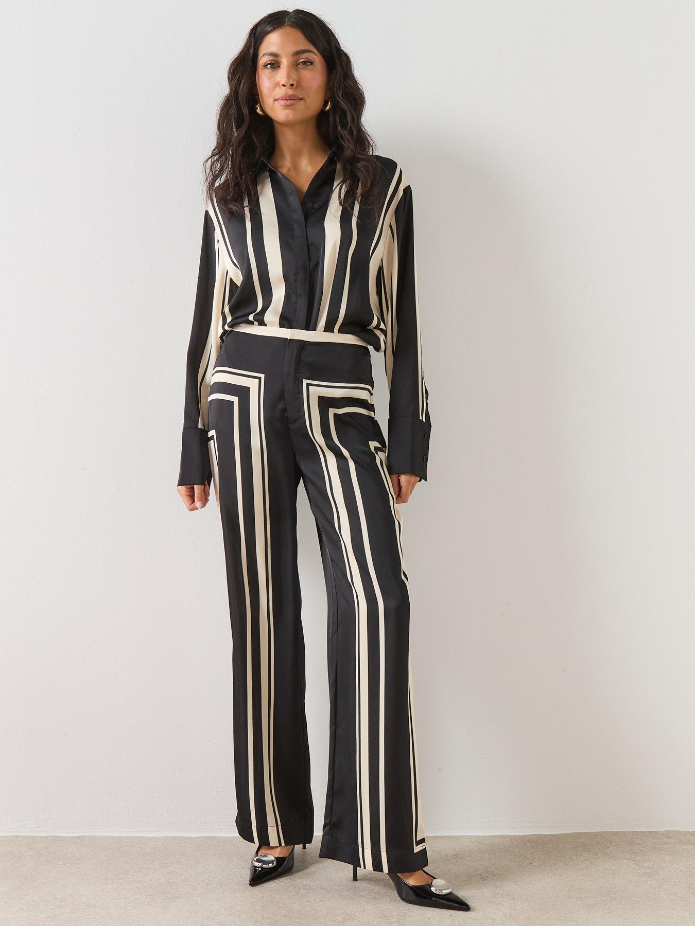 Image 4 of 6 of Mango Satin Printed Trousers - Black