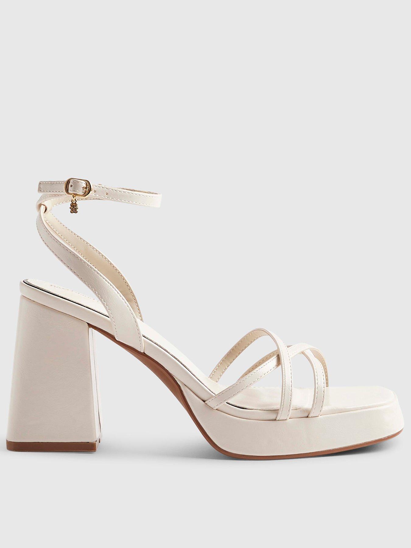 Image 1 of 4 of River Island Block Heel Cross Strap Sandal - White
