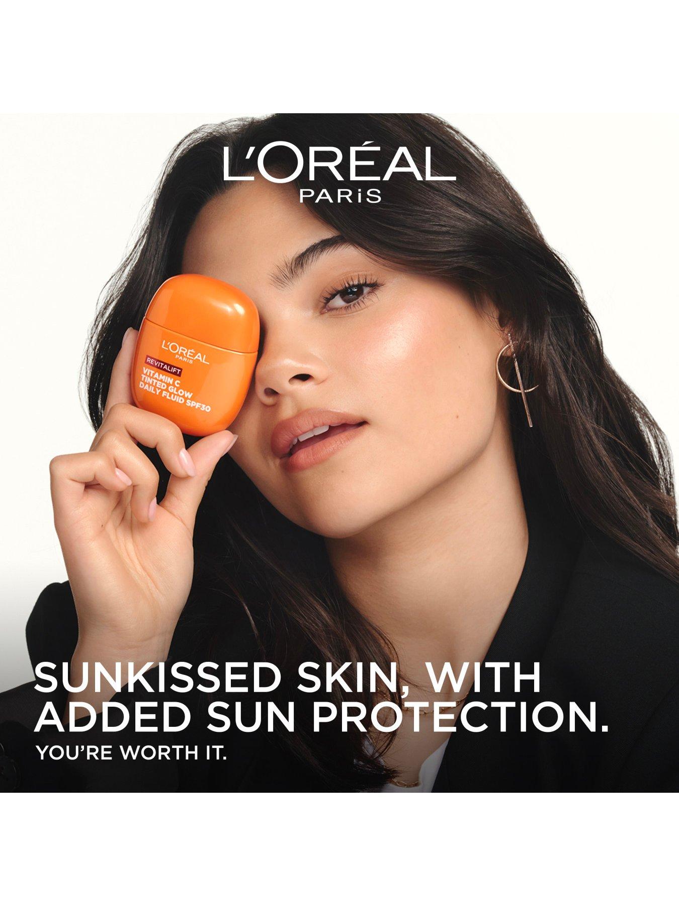 Image 3 of 7 of L'Oreal Paris Revitalift Clinical Vitamin C Tinted Glow Daily Fluid SPF 30