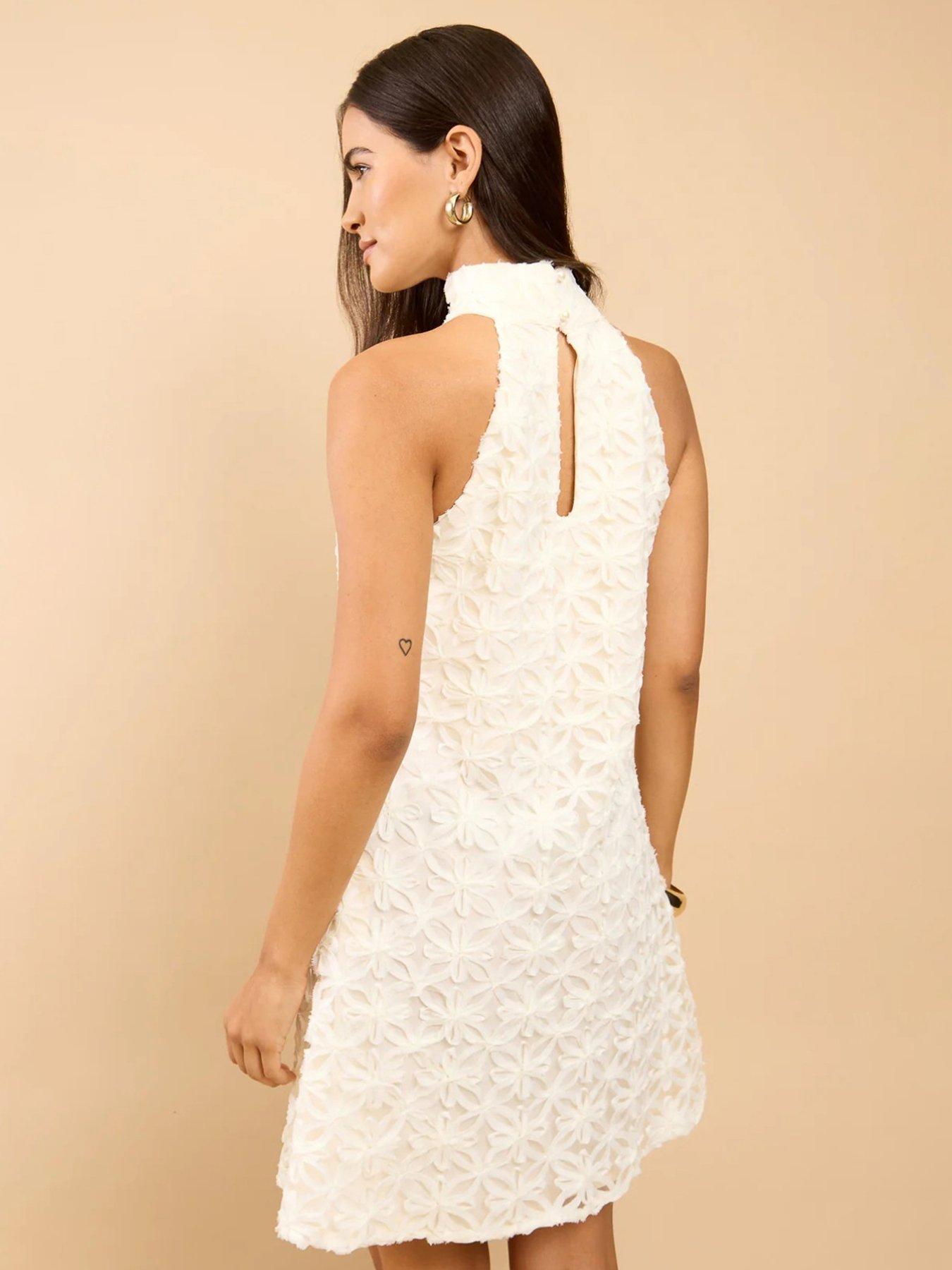 Image 2 of 4 of Little Mistress Cream Textured Halterneck Mini Dress