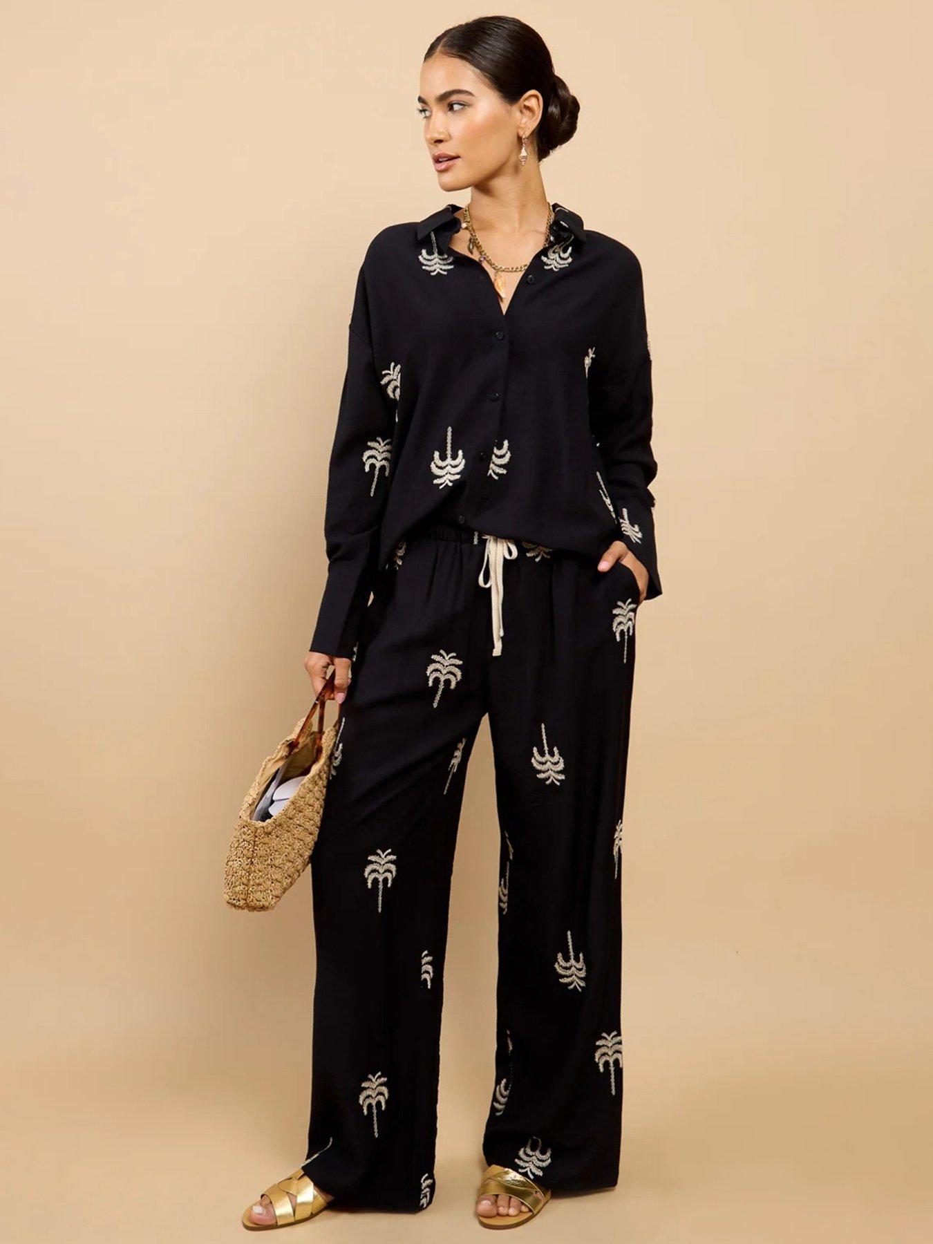 Image 1 of 4 of Little Mistress Black Embroidered Trousers