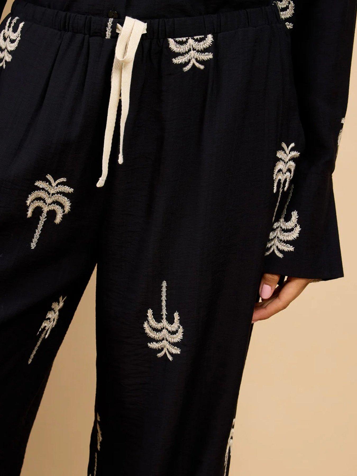 Image 4 of 4 of Little Mistress Black Embroidered Trousers