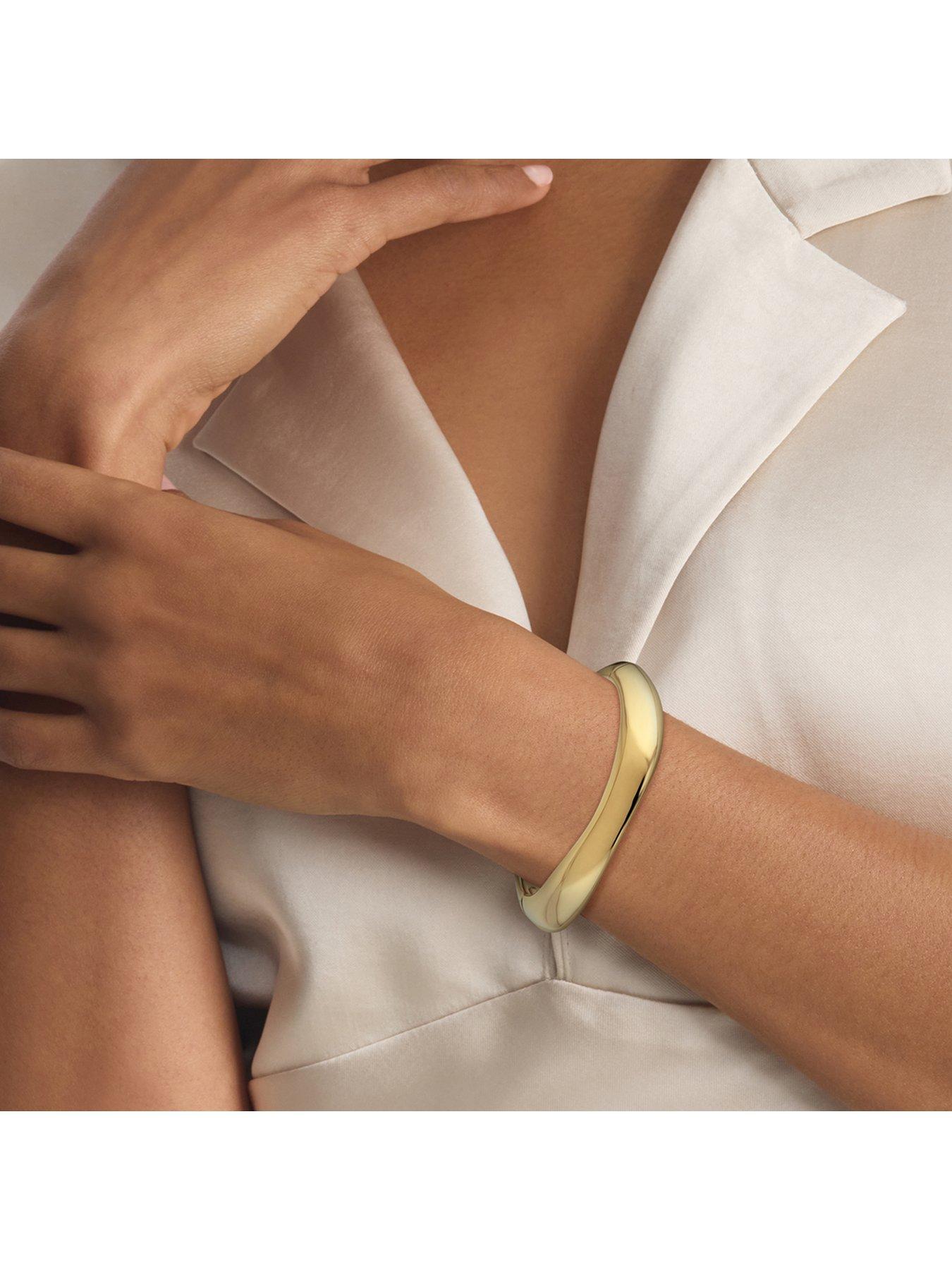 Image 3 of 4 of Calvin Klein Womens CK Sculpted Gold Plated Bangle