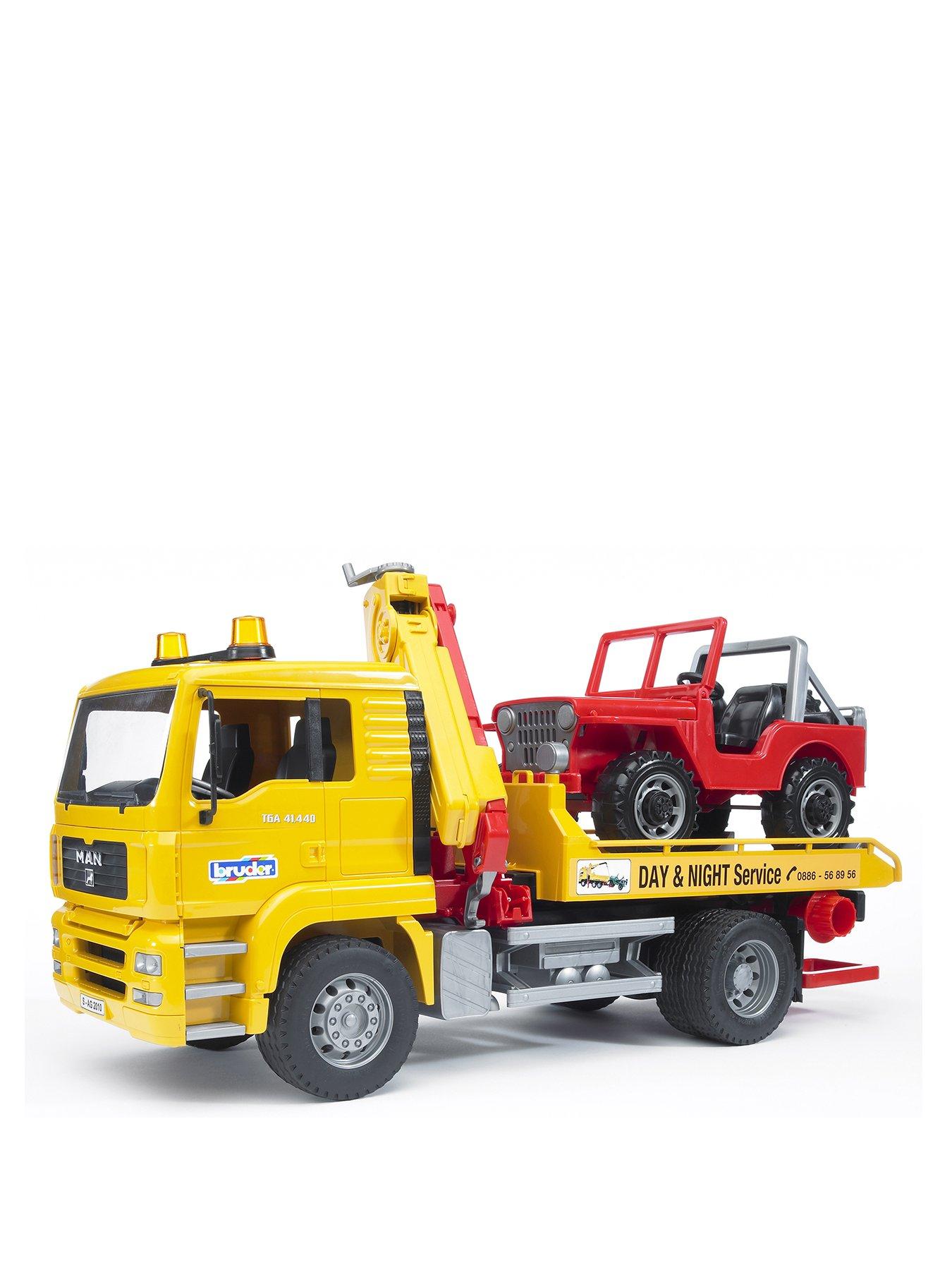 Image 1 of 7 of Bruder MAN TGA Breakdown-truck with cross country vehicle