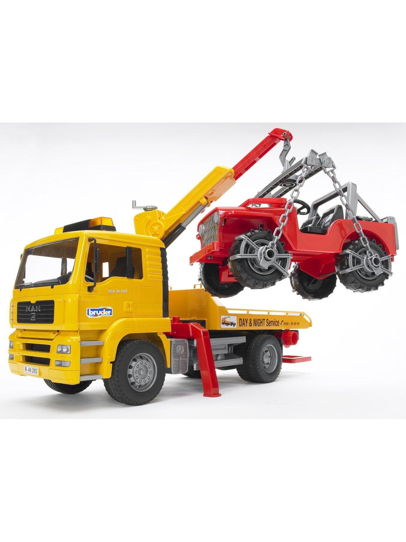Image 2 of 7 of Bruder MAN TGA Breakdown-truck with cross country vehicle