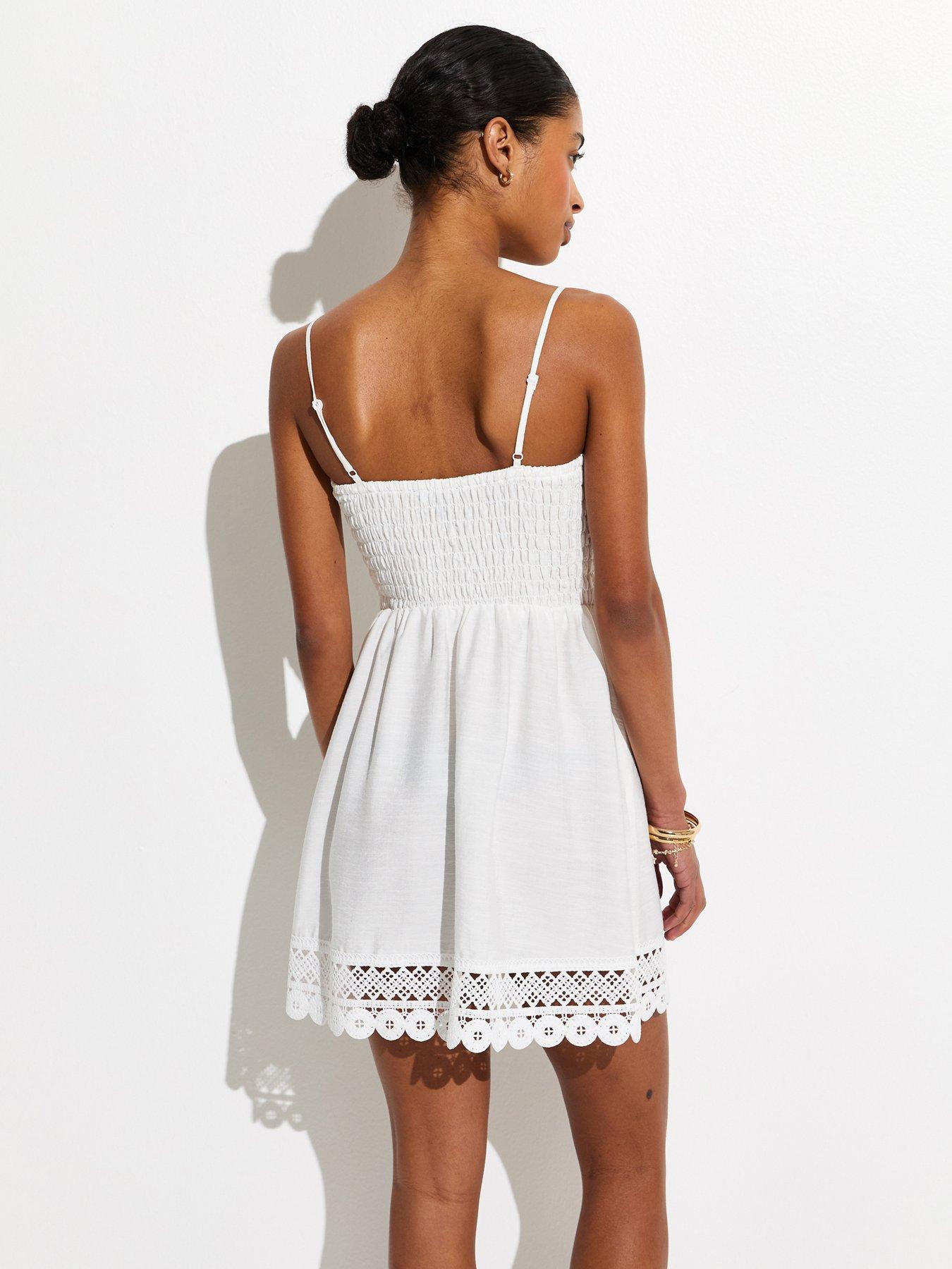 Image 2 of 5 of New Look White Lace Trim Shirred Mini Dress