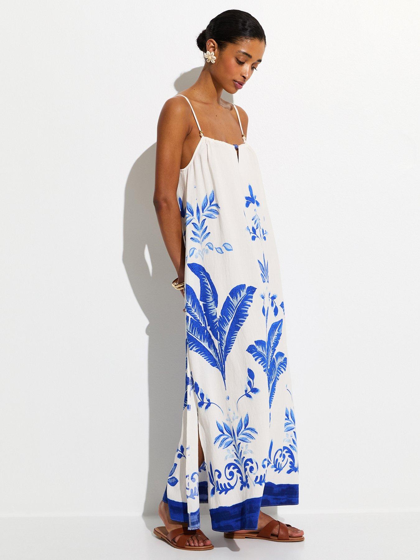 Image 1 of 5 of New Look White And Blue Painted Leaf Pattern Beach Maxi Dress