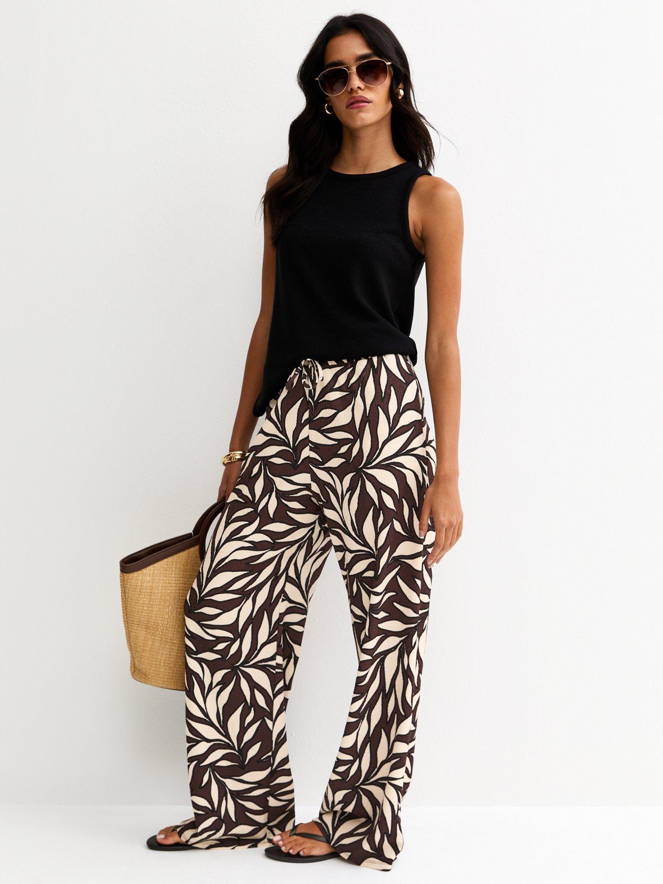 Image 3 of 5 of New Look Leaf Print Crinkle Texture Wide Leg Trousers - Brown