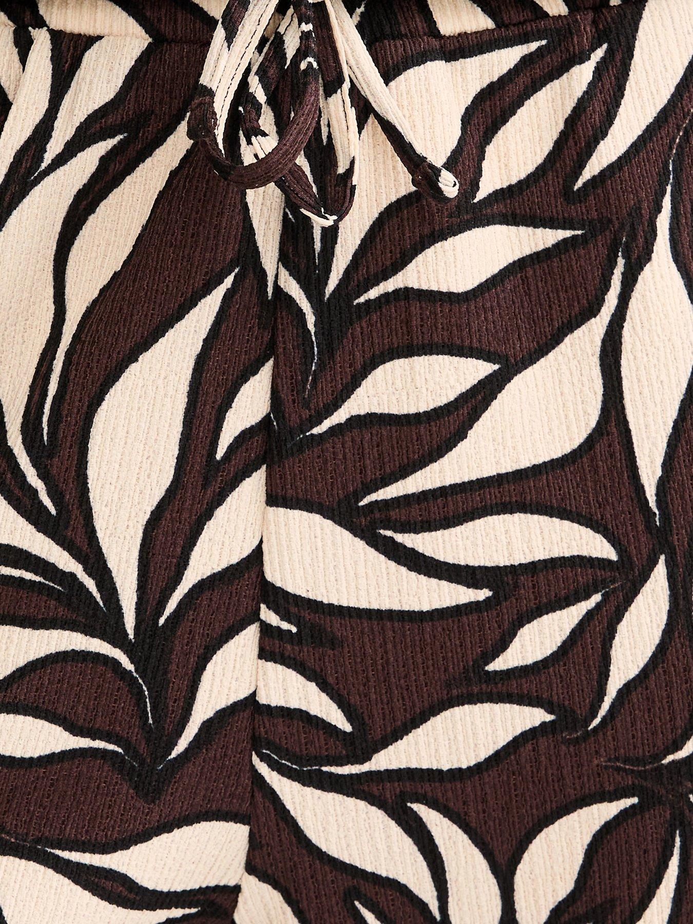 Image 5 of 5 of New Look Leaf Print Crinkle Texture Wide Leg Trousers - Brown