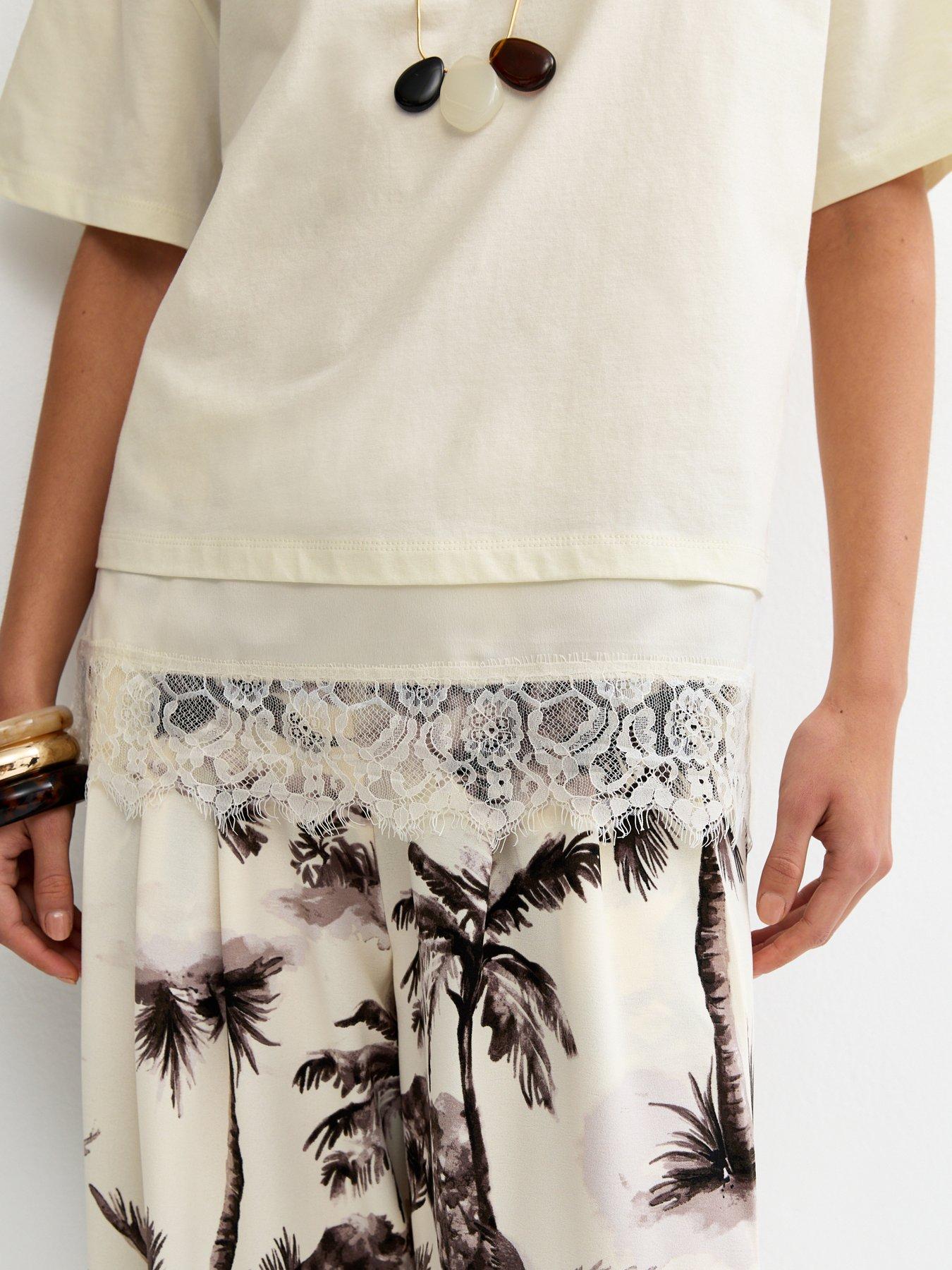 Image 4 of 5 of New Look Satin Lace Hem Oversized T-Shirt - White