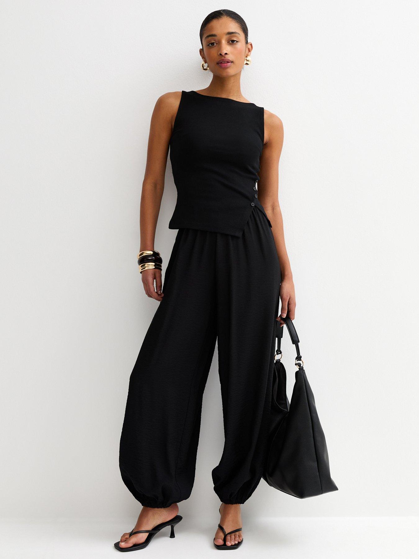 Image 3 of 5 of New Look Asymmetric Hem Button Side Vest Top - Black