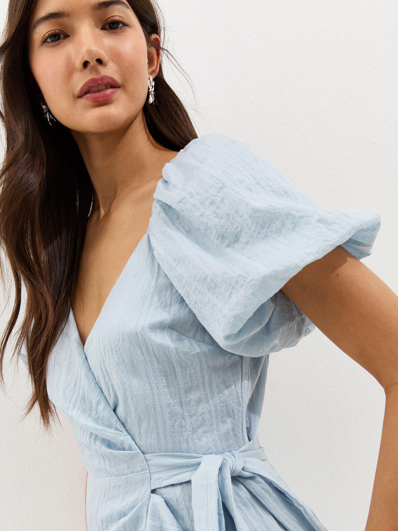 Image 4 of 5 of New Look Textured Ruffle Trimmed Wrap Midi Dress - Light Blue