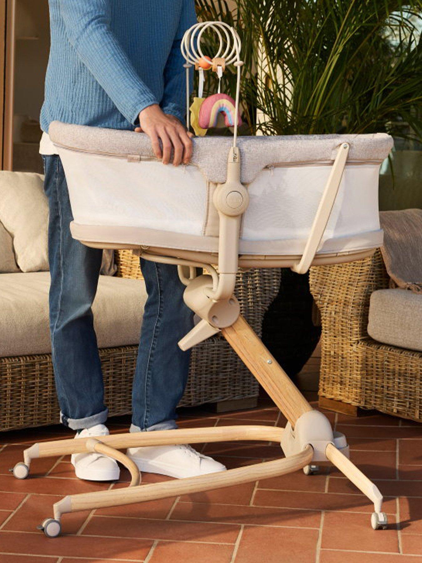 Image 1 of 8 of Chicco Baby Hug 4-in-1 Newborn Crib and Toddler Chair, Adjustable, Activity Bar