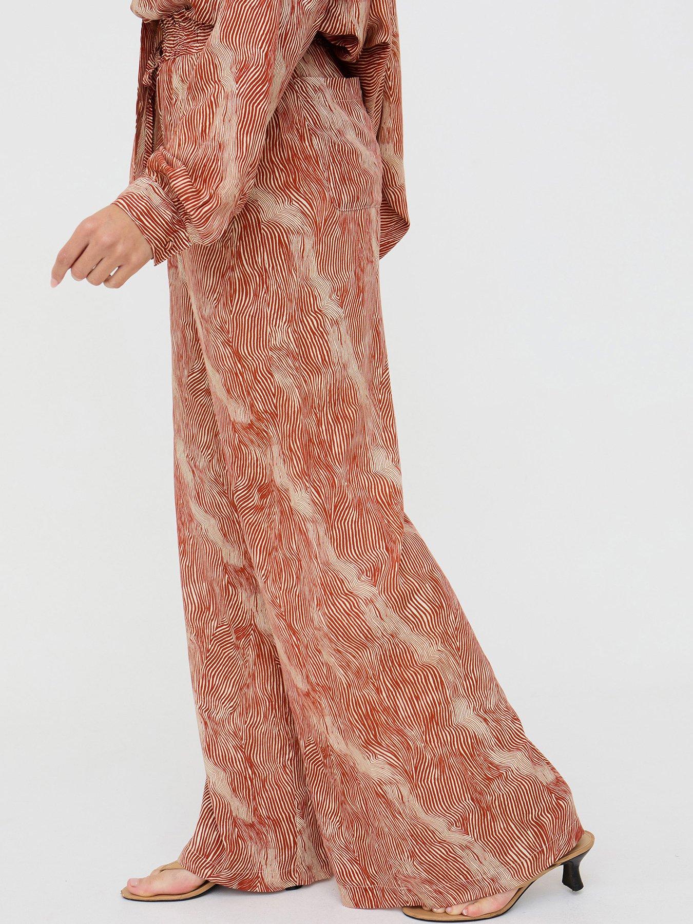 Image 2 of 3 of Raffya Ginger High Waist Tiger Print Trouser In Ginger Orange
