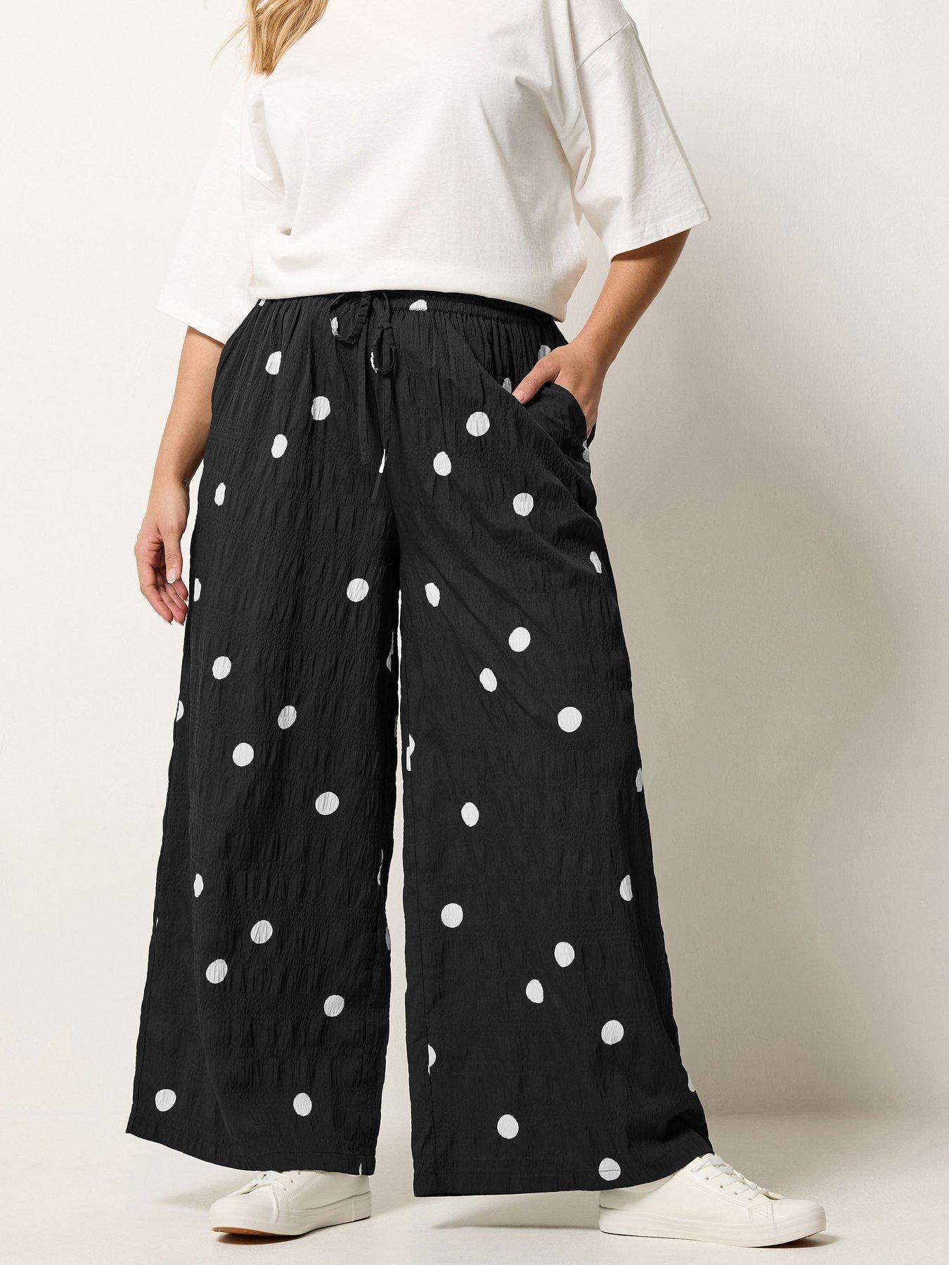 Image 1 of 5 of Yours Curve Woven Polka Dot Printed Trousers