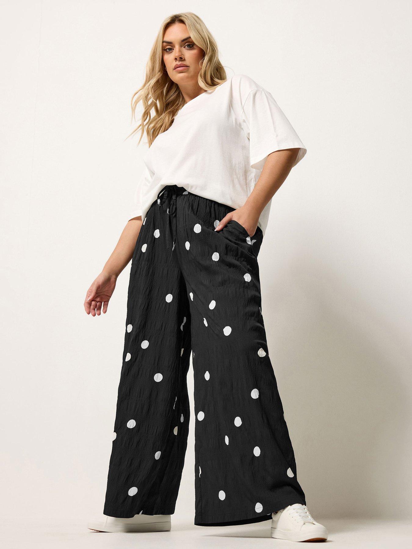 Image 3 of 5 of Yours Curve Woven Polka Dot Printed Trousers