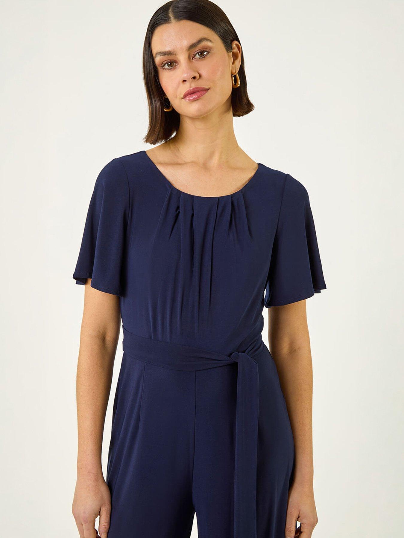Image 4 of 5 of Roman Pleat Neck Belted Jumpsuit