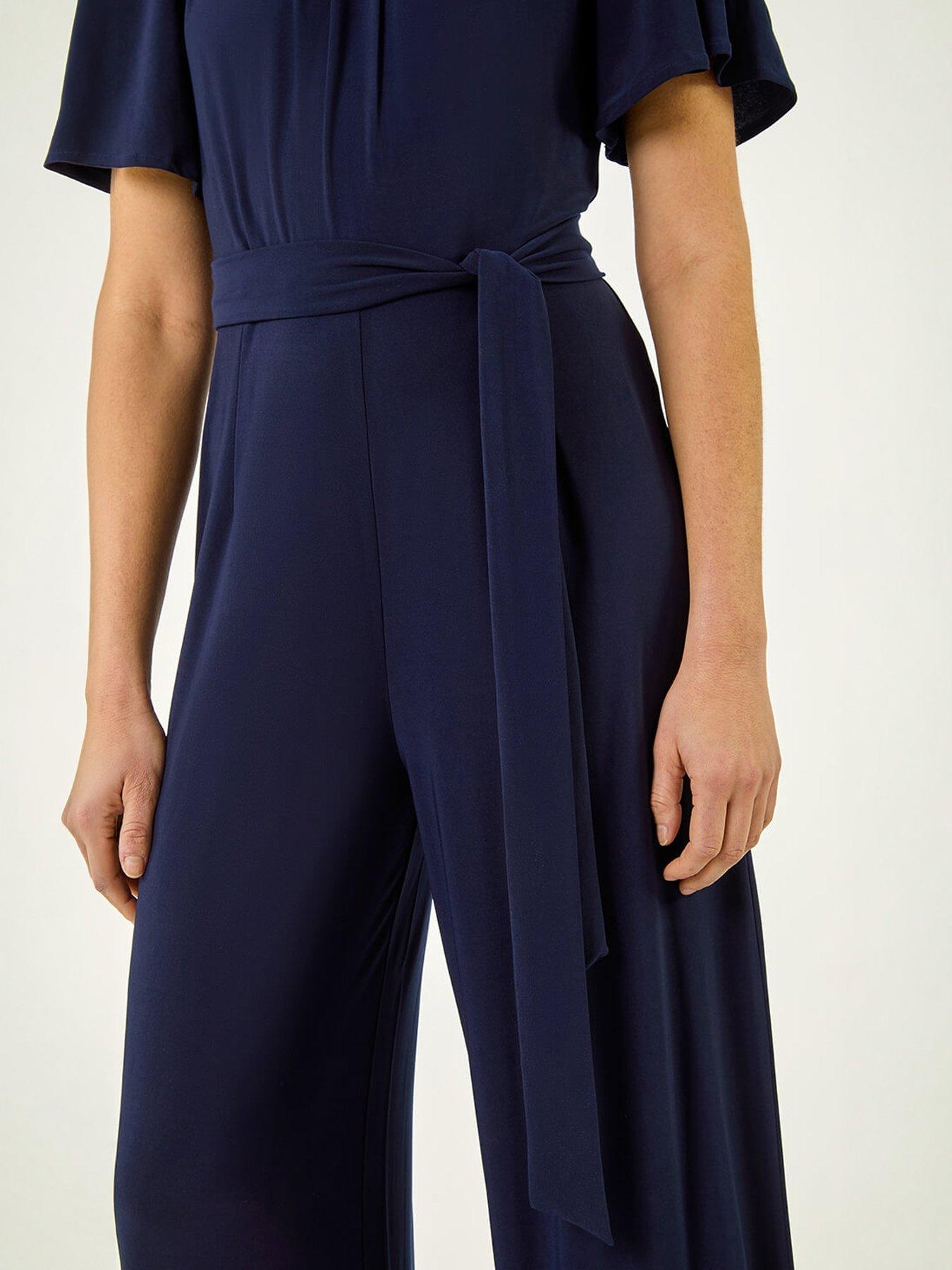 Image 5 of 5 of Roman Pleat Neck Belted Jumpsuit