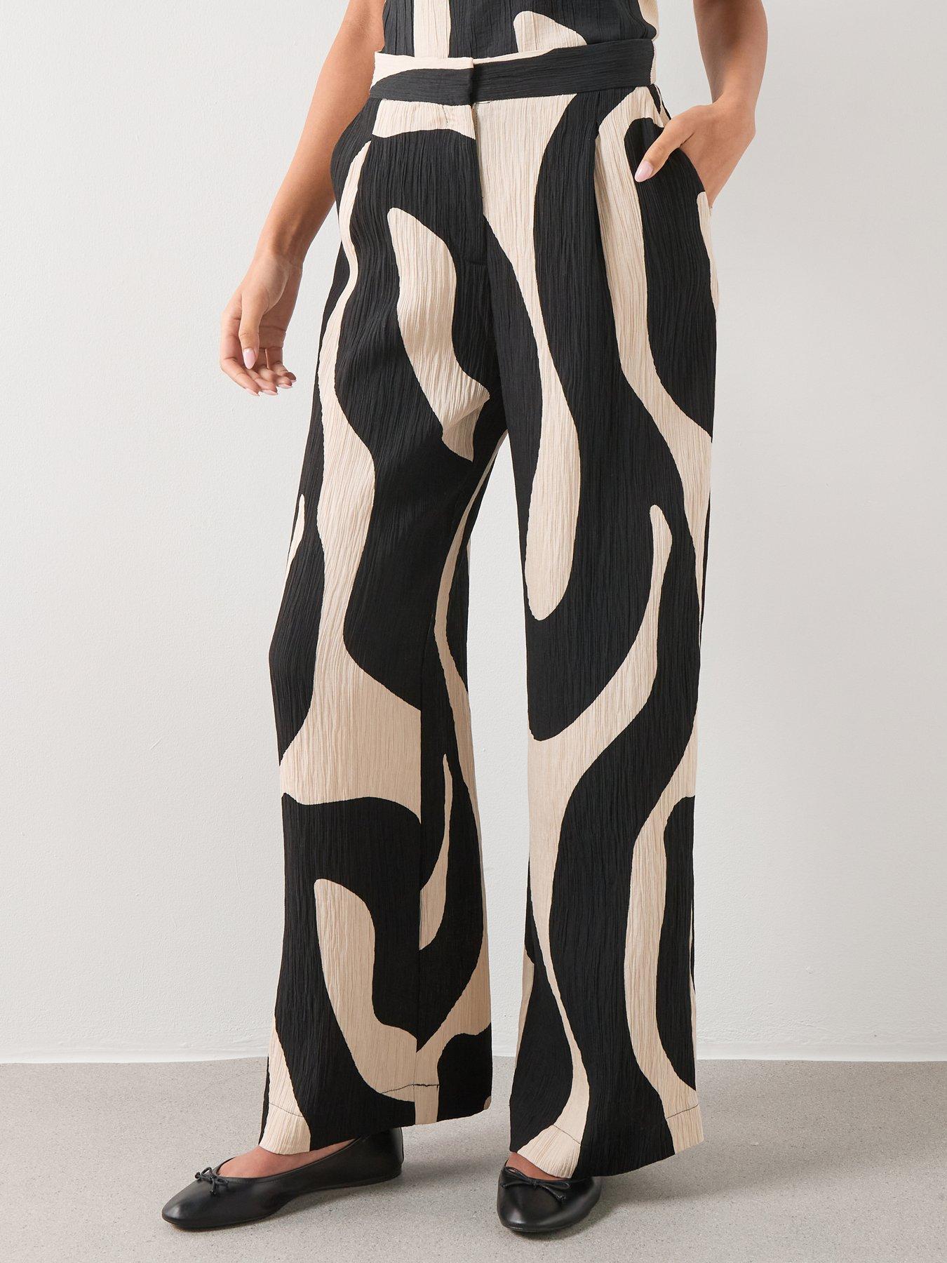 Image 1 of 6 of Mango Printed Straight Trousers - Black