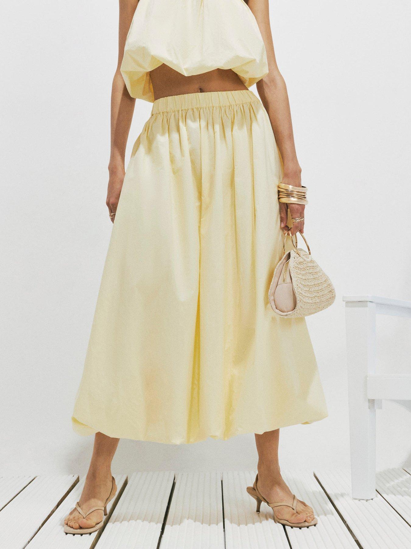 Image 1 of 4 of River Island Poplin Bubble Hem Skirt - Yellow