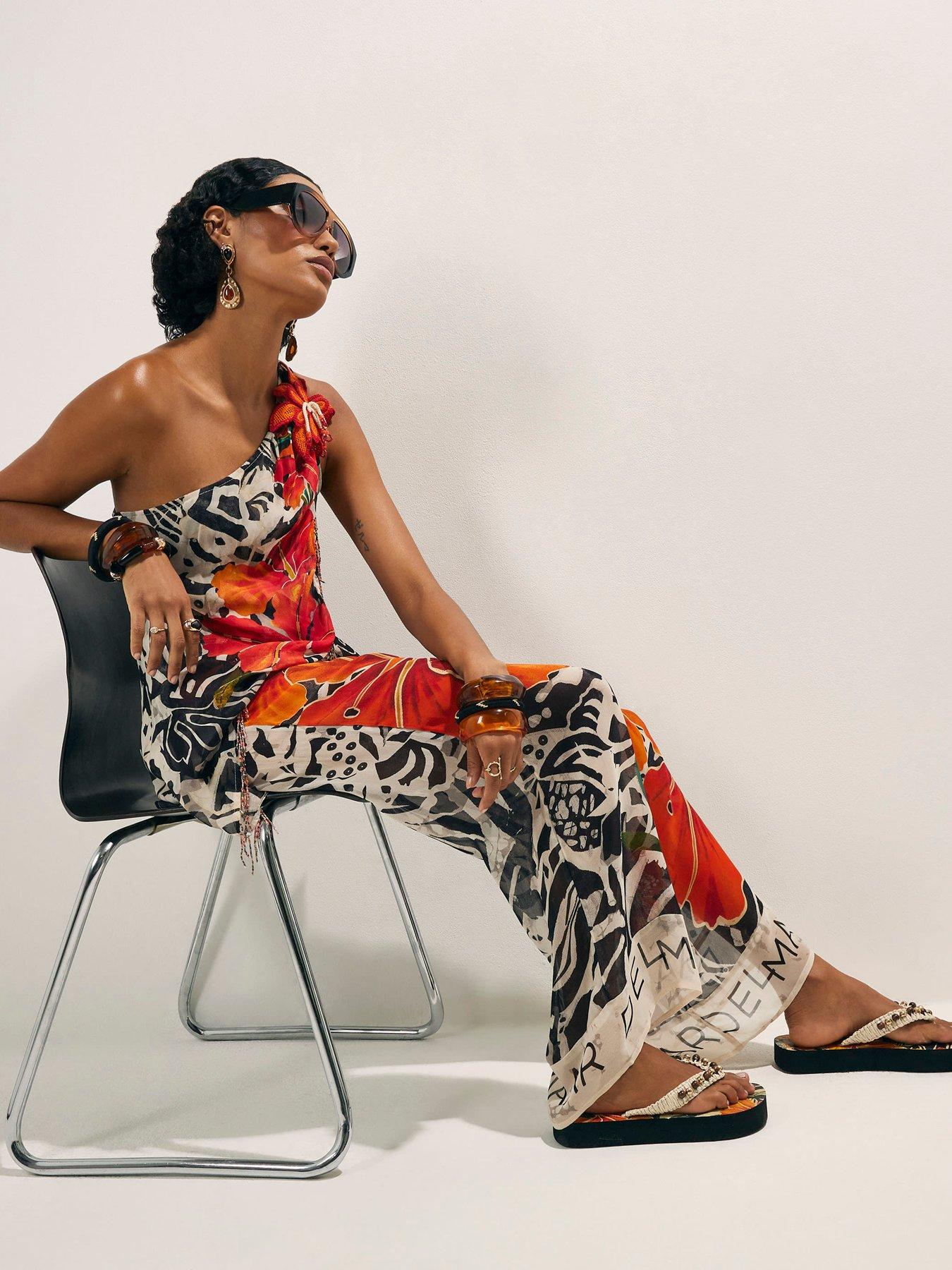 Image 3 of 6 of River Island Del Mar Wide Leg Floral Placed Trouser - Black