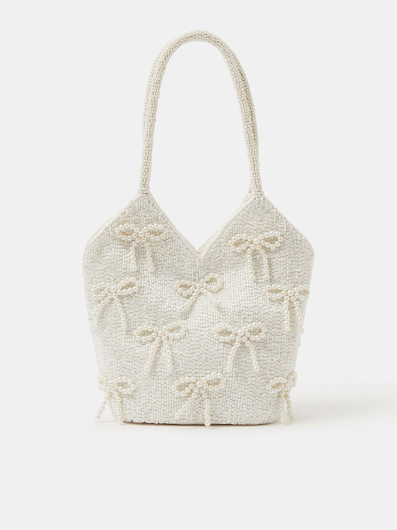 Image 1 of 4 of Accessorize Pearl Bow Beaded Bridal Bag