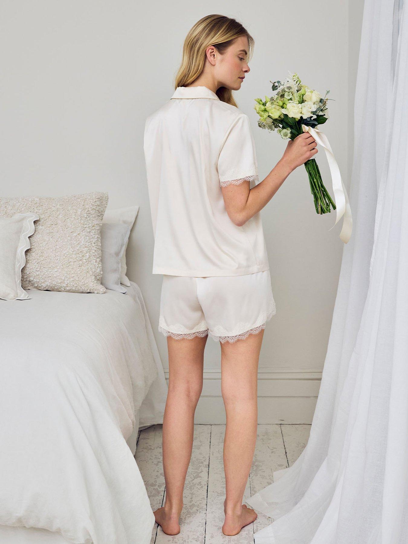 Image 2 of 6 of CHELSEA PEERS Satin Tulip Hem Lace Trim Button Up Short Pyjama Set - Cream
