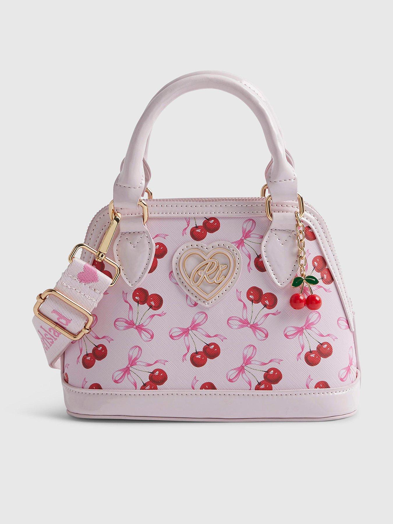 Image 1 of 5 of River Island Older Girls Cherry Bow Cross Body Bag - Pink