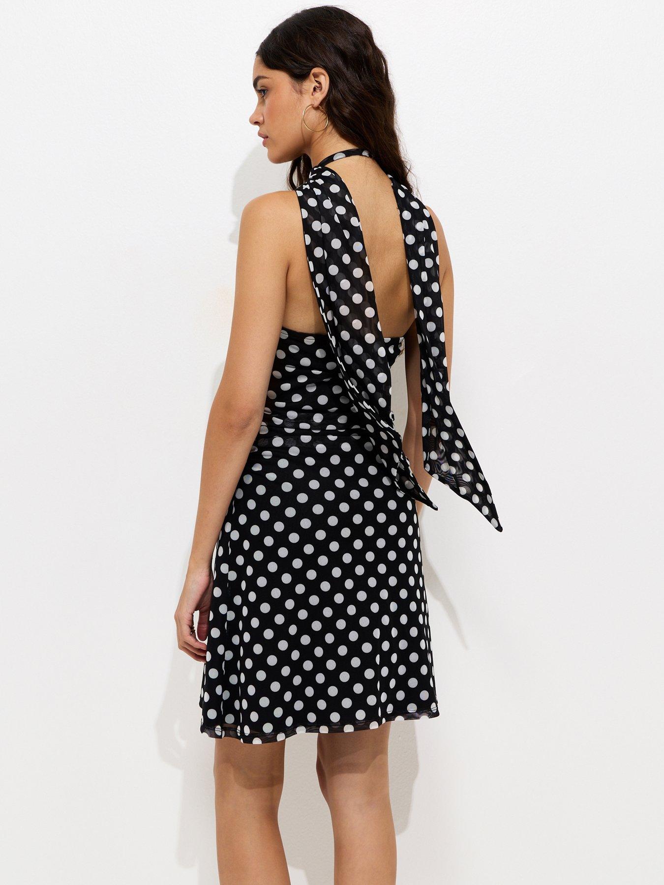 Image 2 of 5 of New Look Polka Dot Halter Neck Mesh Mini Dress - Black