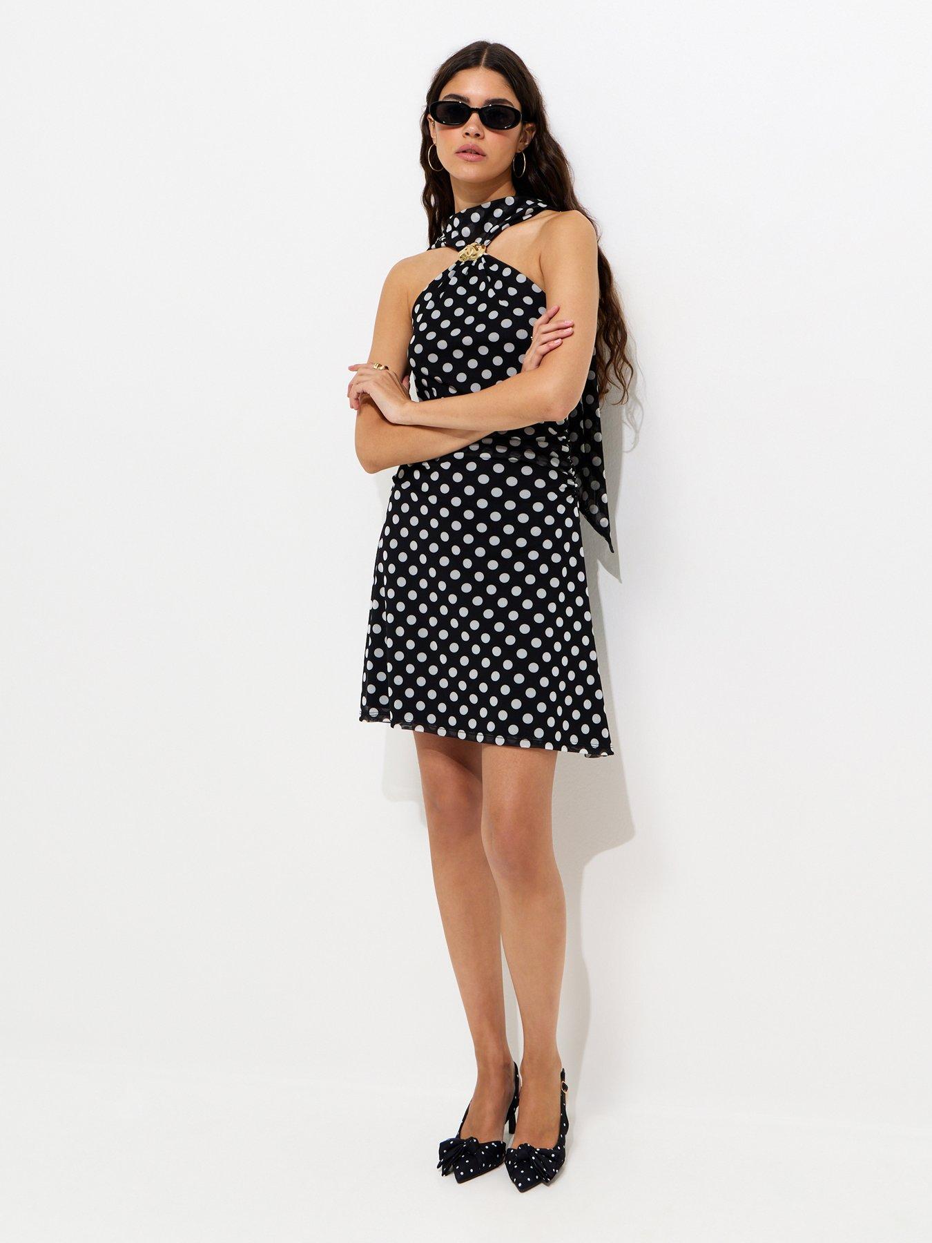 Image 4 of 5 of New Look Polka Dot Halter Neck Mesh Mini Dress - Black