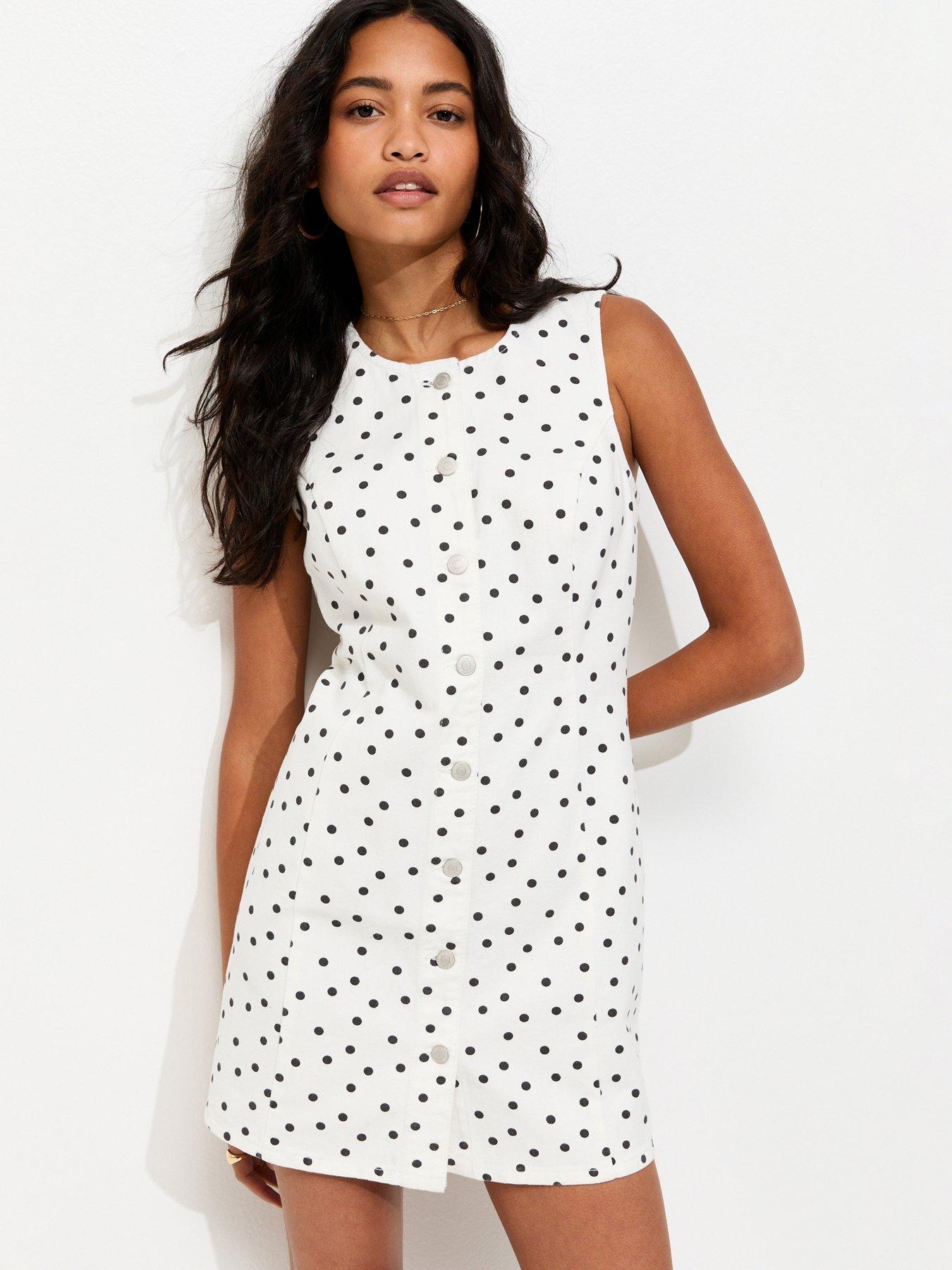 Image 1 of 5 of New Look White Polka Dot Denim Mini Dress