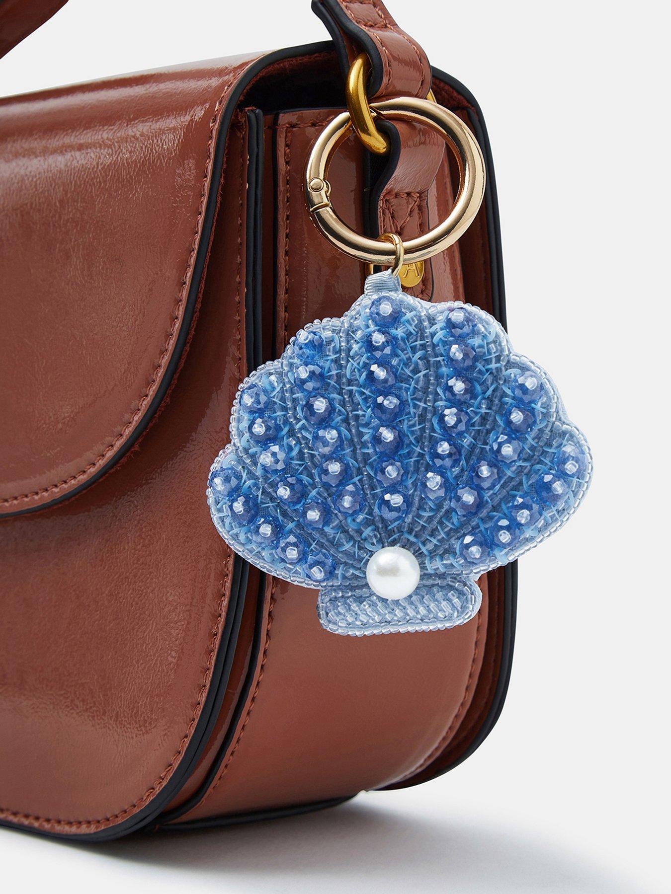 Image 2 of 3 of Accessorize Shell Beaded Bag Charm