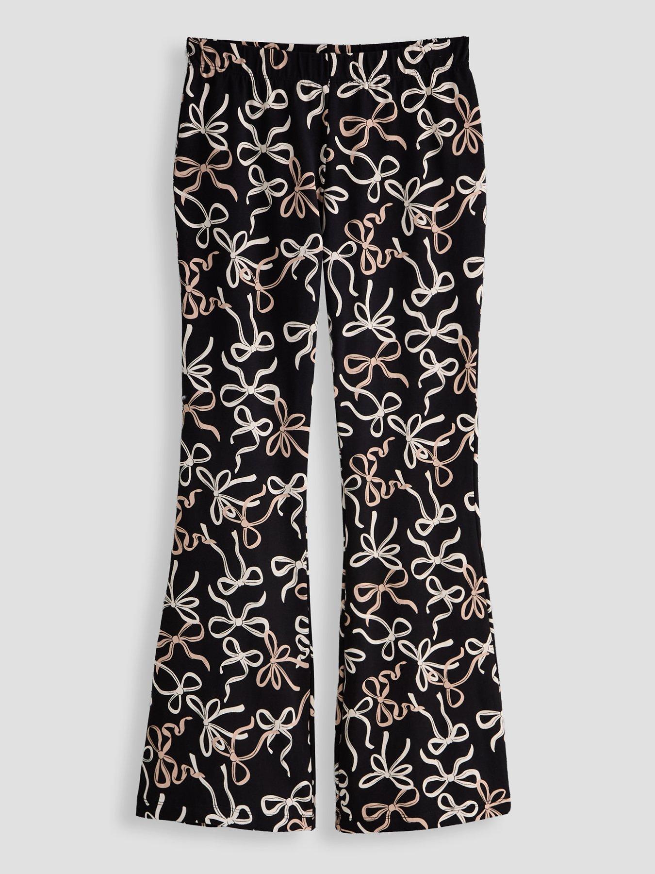 Image 1 of 4 of The Very Collection Girls Bow Print Flare Leggings (3 - 16 years) - Black