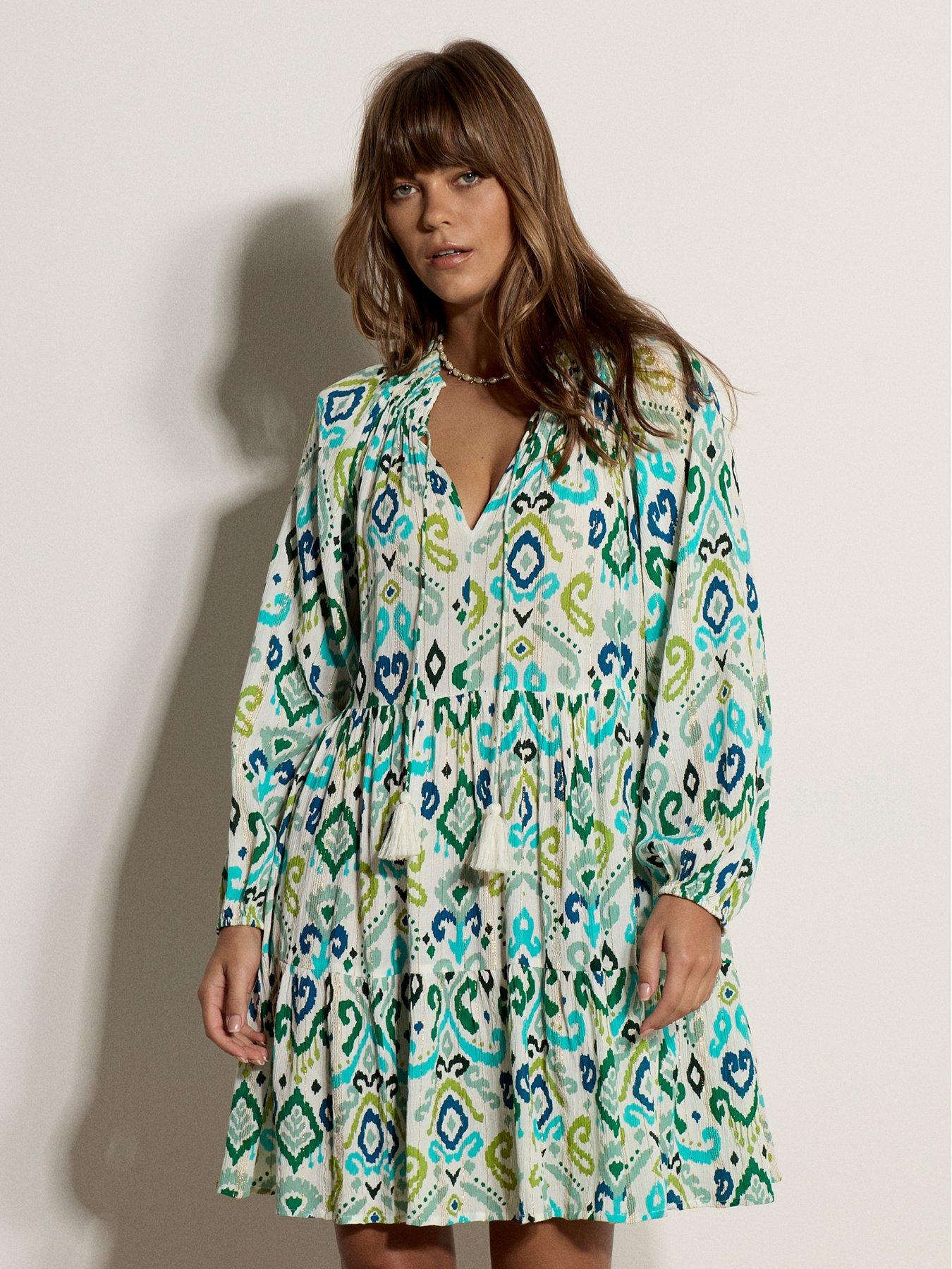 Image 1 of 5 of Apricot Ikat Lurex Chiffon Babydoll Tiered Ruffle Neck Dress