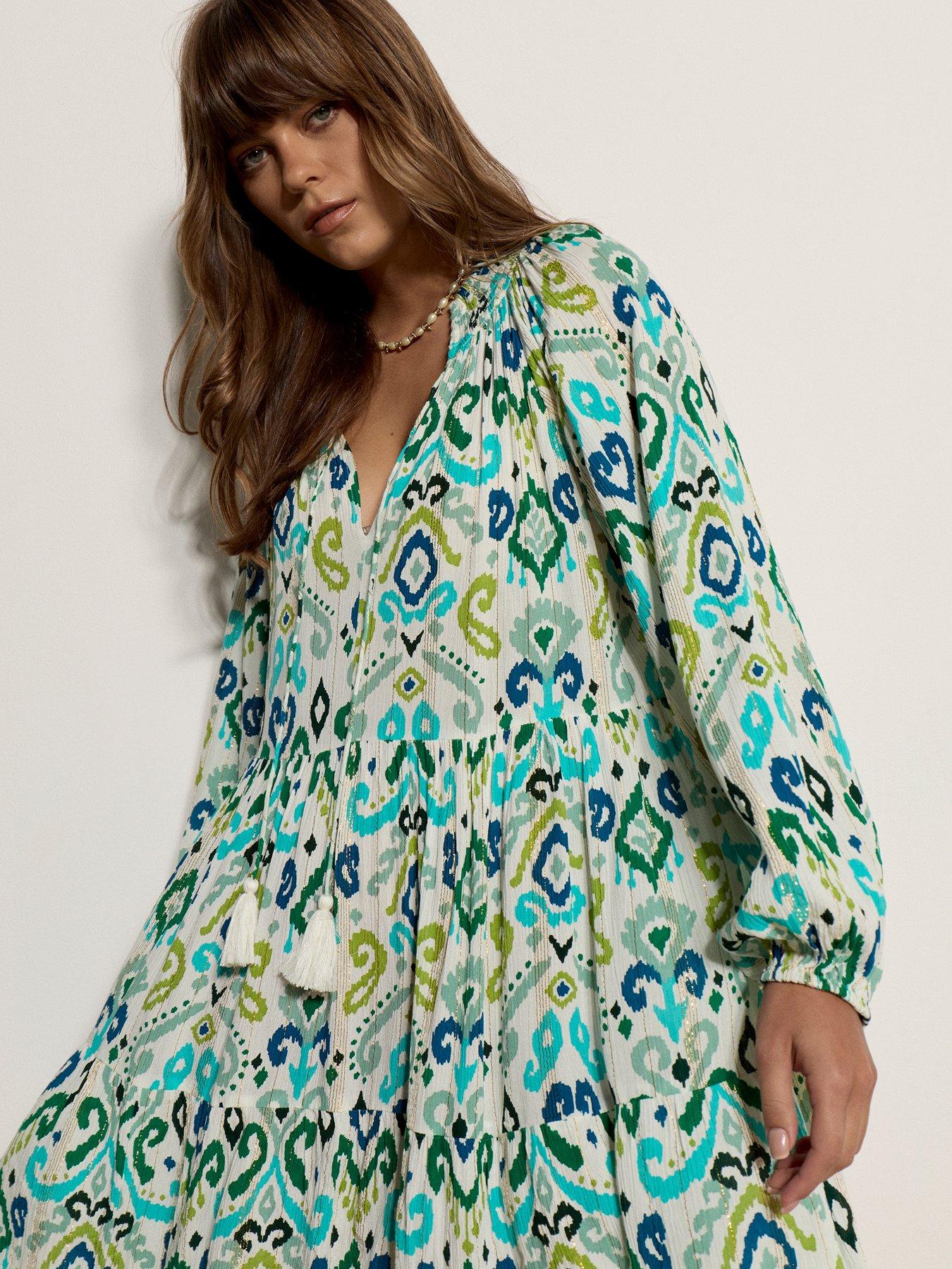 Image 4 of 5 of Apricot Ikat Lurex Chiffon Babydoll Tiered Ruffle Neck Dress