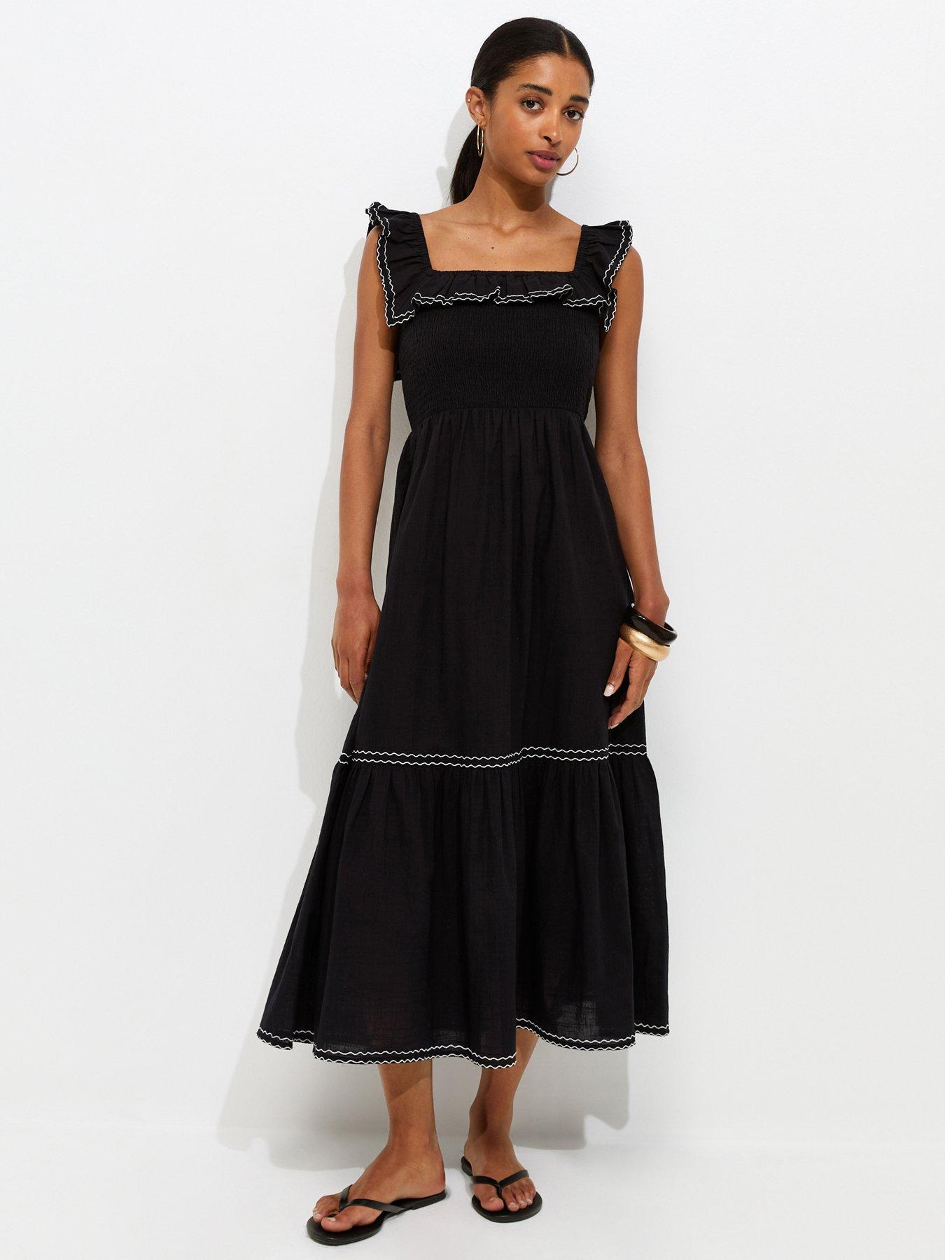 Image 1 of 6 of New Look Cotton Embroidered Ruffle Trim Midi Dress - Black