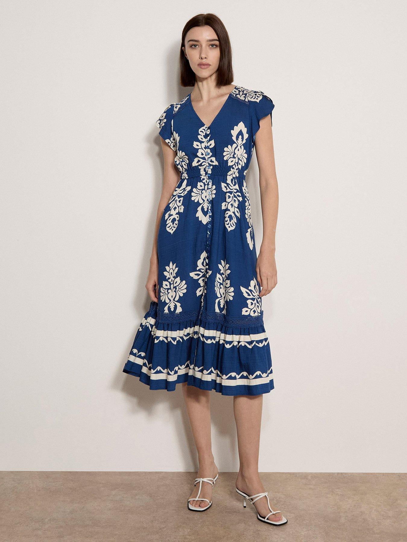 apricot blue floral dress Medallion Border Crochet Detail Button Thru Midi - Linen Diagonal Wrap Dress neckline with shirred bodice Waist Size:42 Gamecock