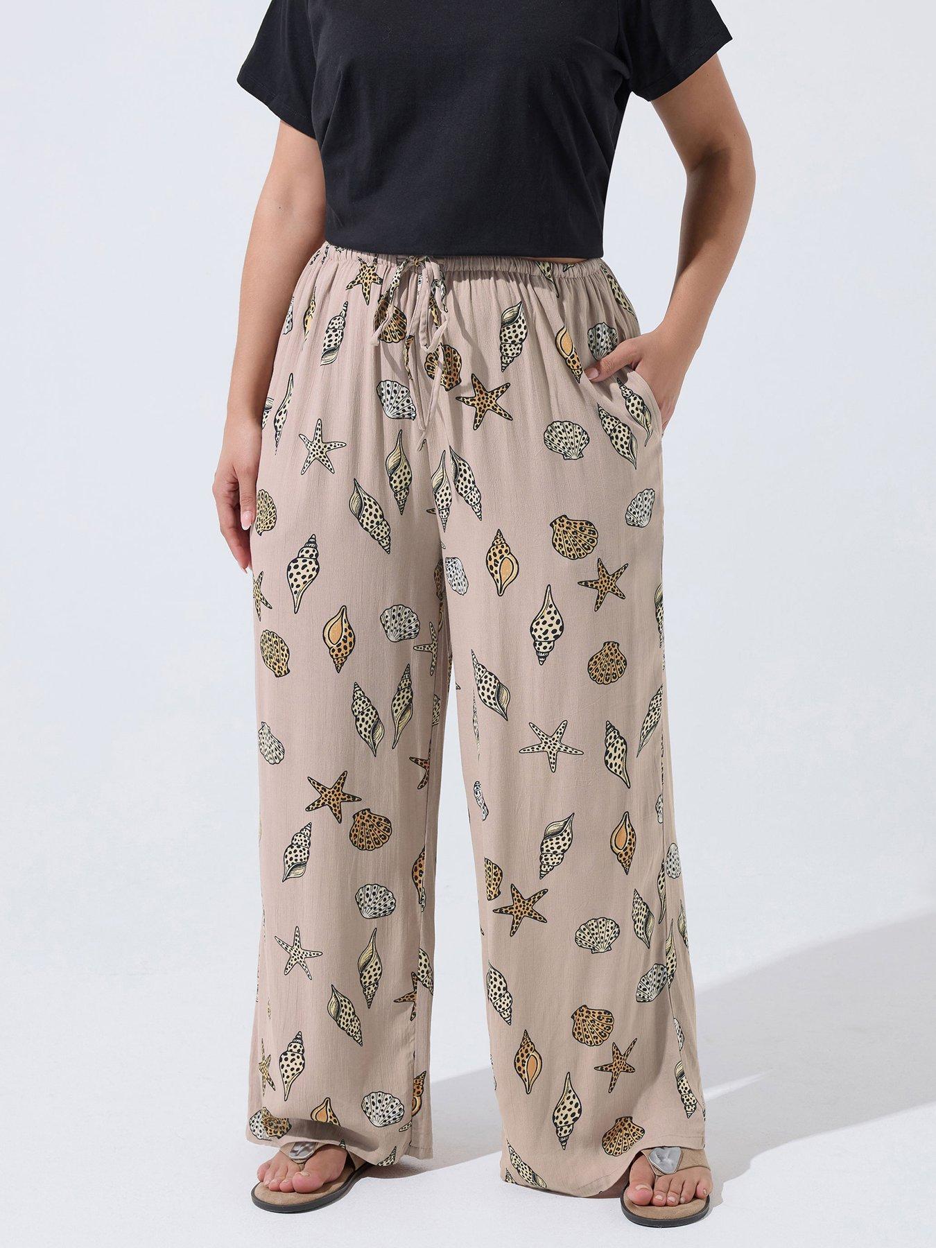 Image 1 of 4 of Yours Curve Crinkle Stripe Leopard Print Shell Detail Trousers - White