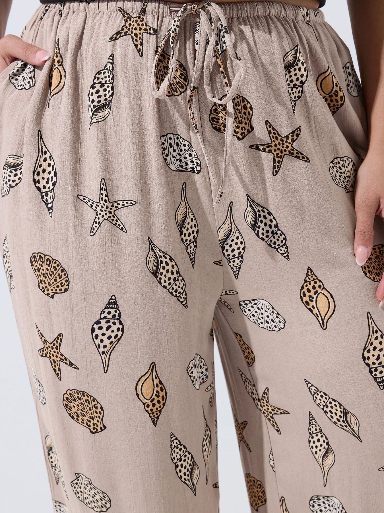 Image 4 of 4 of Yours Curve Crinkle Stripe Leopard Print Shell Detail Trousers - White
