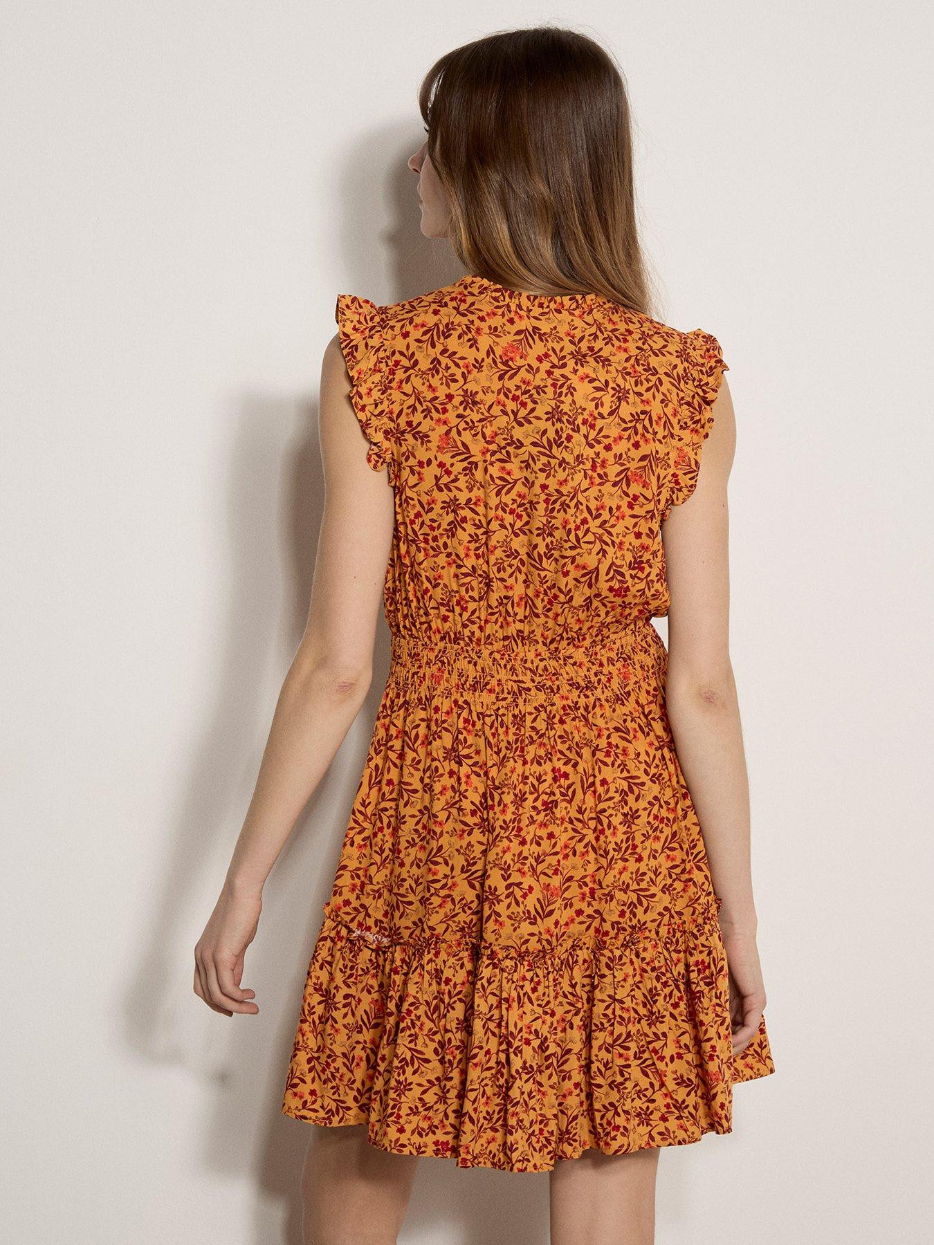 Image 2 of 4 of Apricot Ruffle Tiered Ditsy Mini Dress - Orange