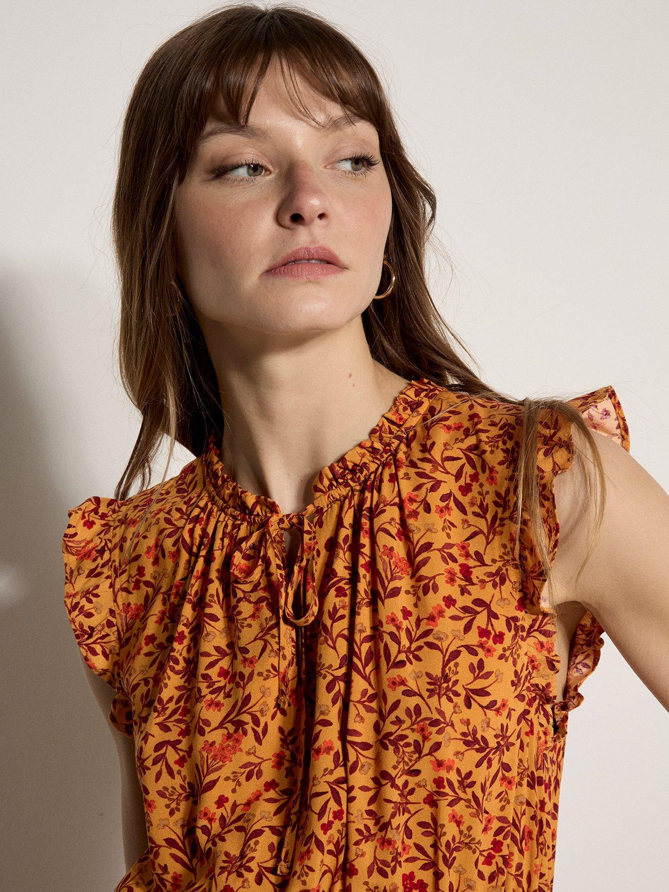 Image 3 of 4 of Apricot Ruffle Tiered Ditsy Mini Dress - Orange