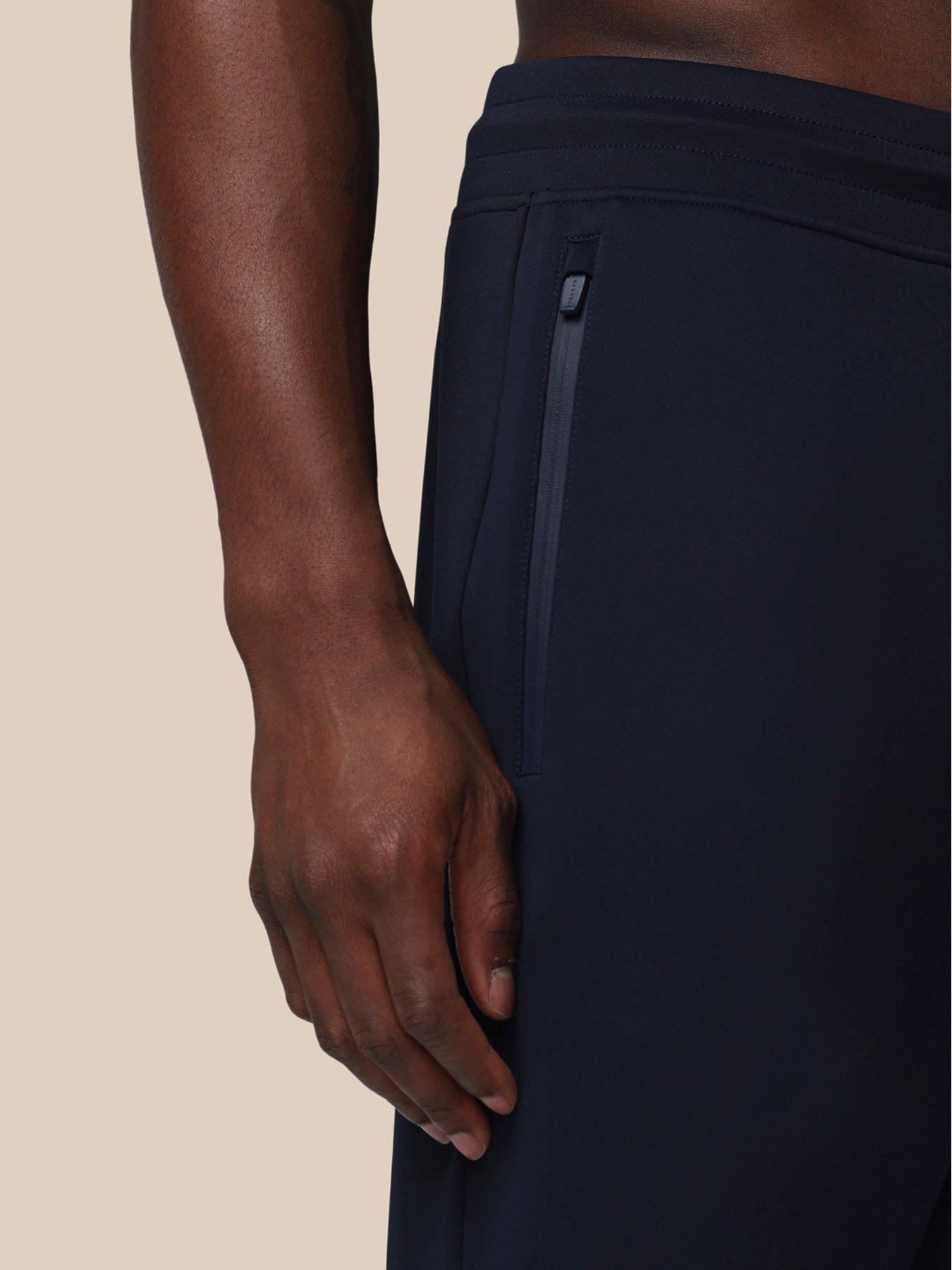 Image 4 of 7 of Castore Mens Training Flex Stretch Zip Pocket Joggers - Navy