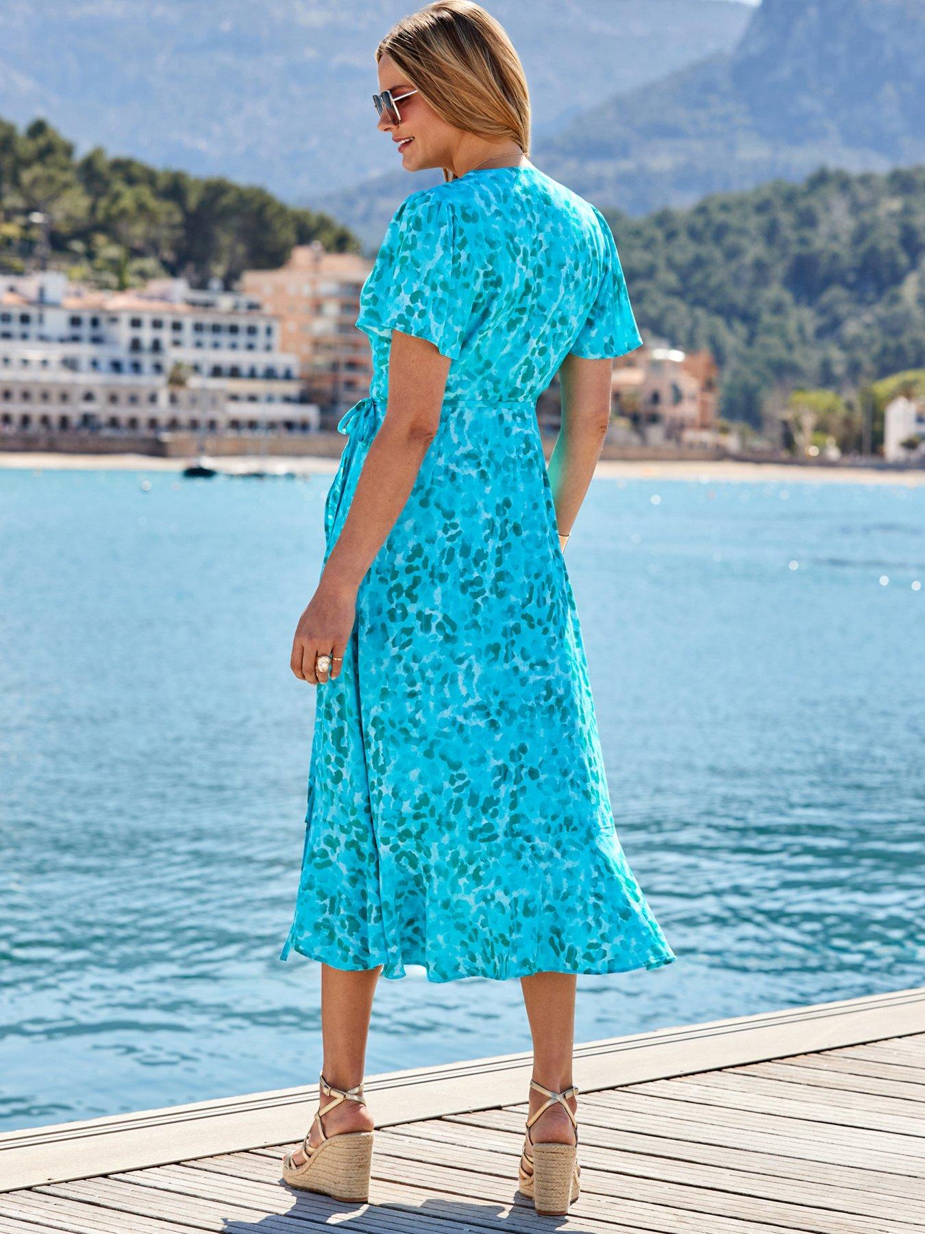 Image 2 of 6 of Sosandar Animal Print Ruffle Hem Wrap Dress - Aqua Blue