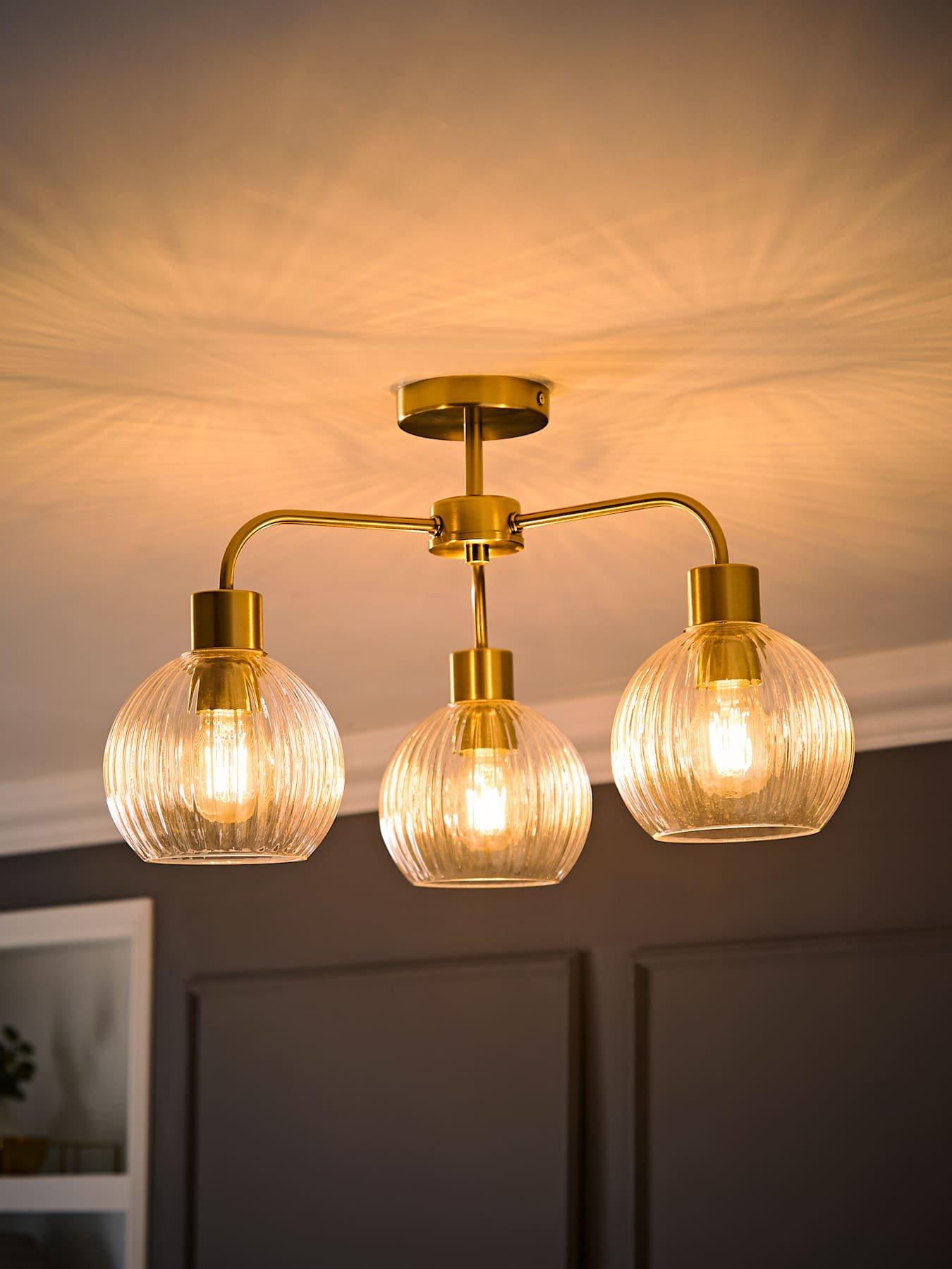 Image 5 of 6 of ValueLights Maddison Clear Ribbed Glass Globe Shades Brushed Gold 3 Arm Ceiling Light