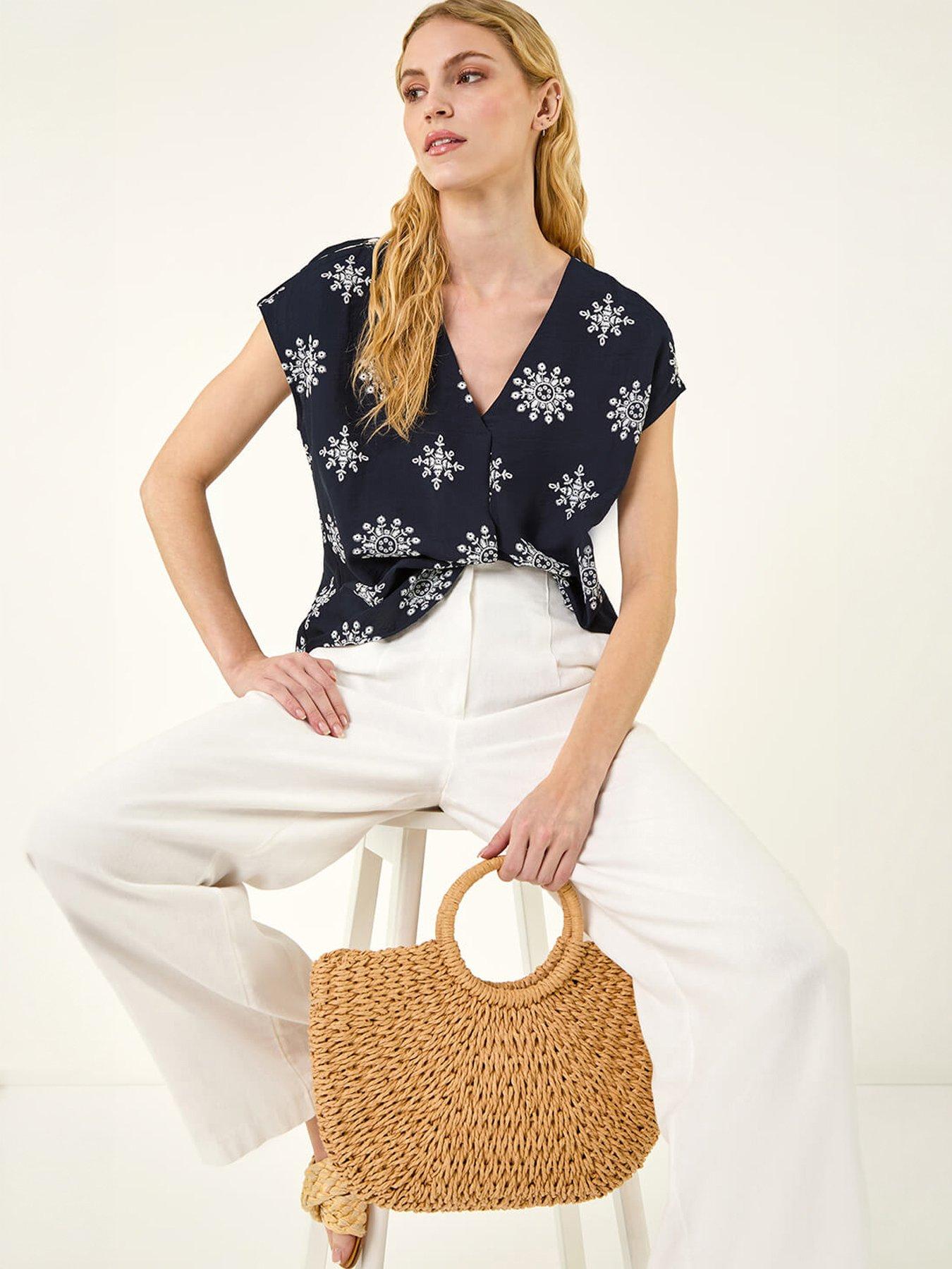 Image 1 of 5 of Roman Embroidered V-neck Pleat Top