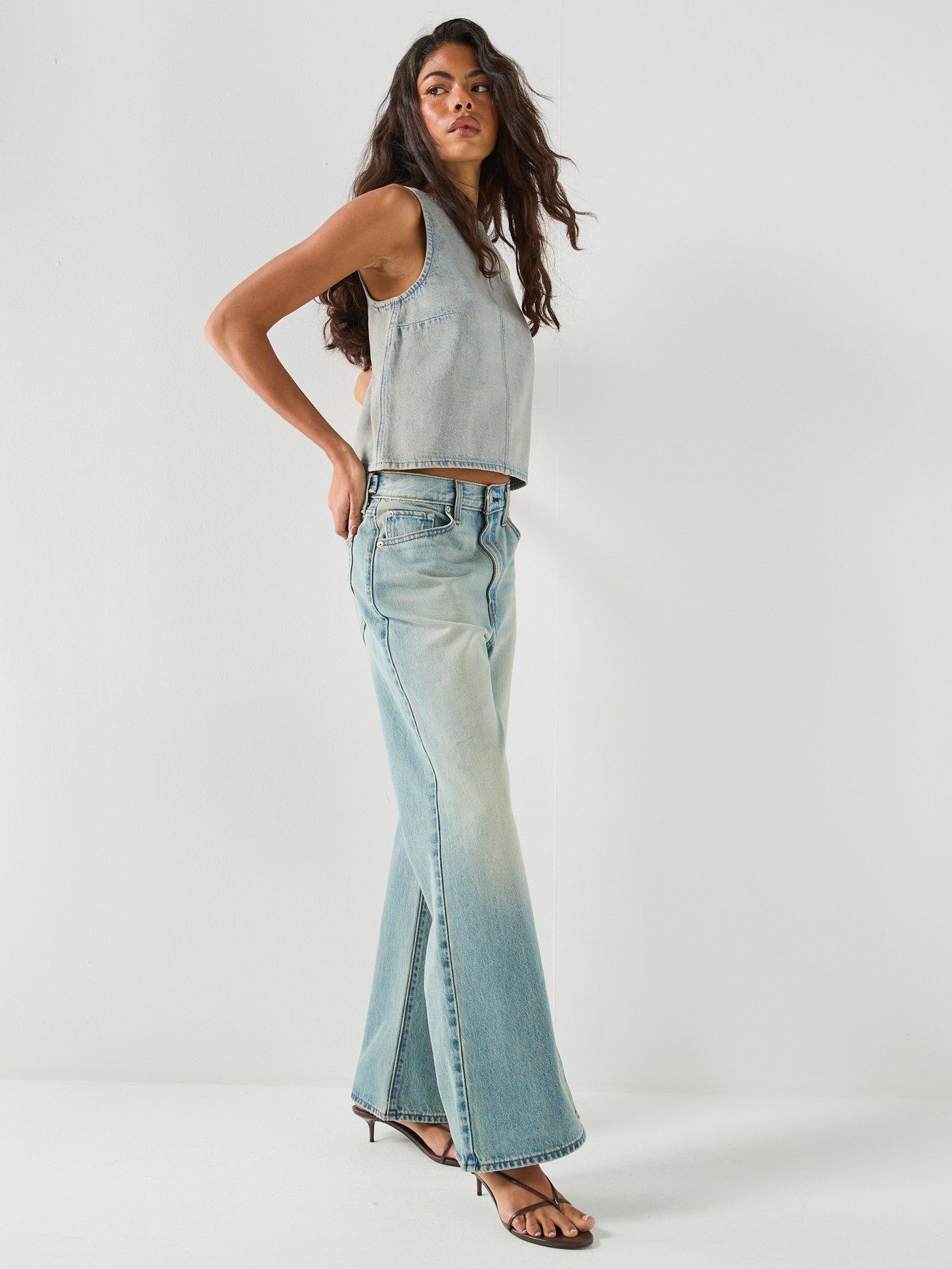 Image 4 of 6 of Levi's Cinch Flare Jeans - Blue