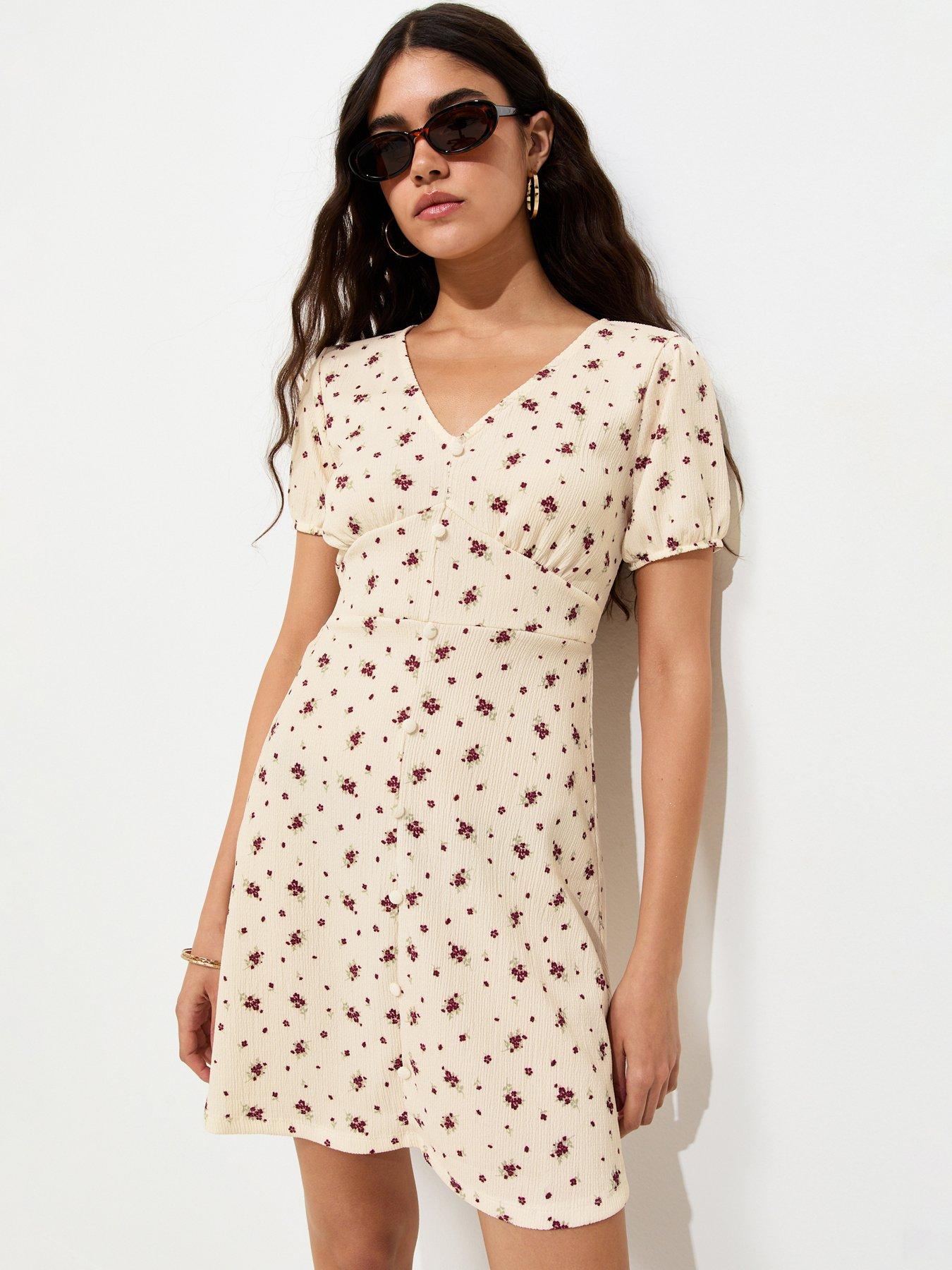 Image 1 of 5 of New Look Floral V-Neck Short Sleeve Mini Dress - White